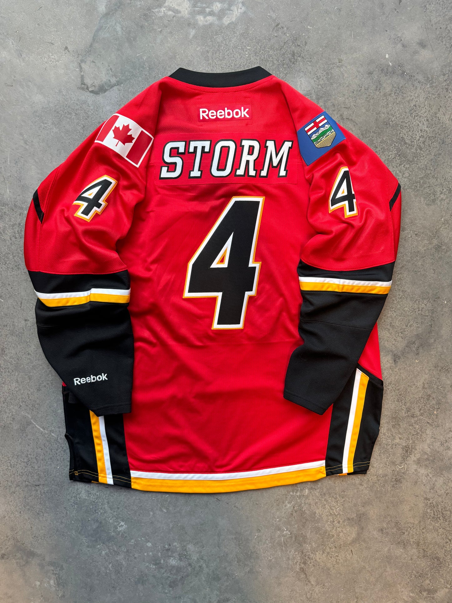 2015 Calgary Flames “Storm” Red Reebok NHL Authentic Fully Embroidered Hockey Jersey (XL)