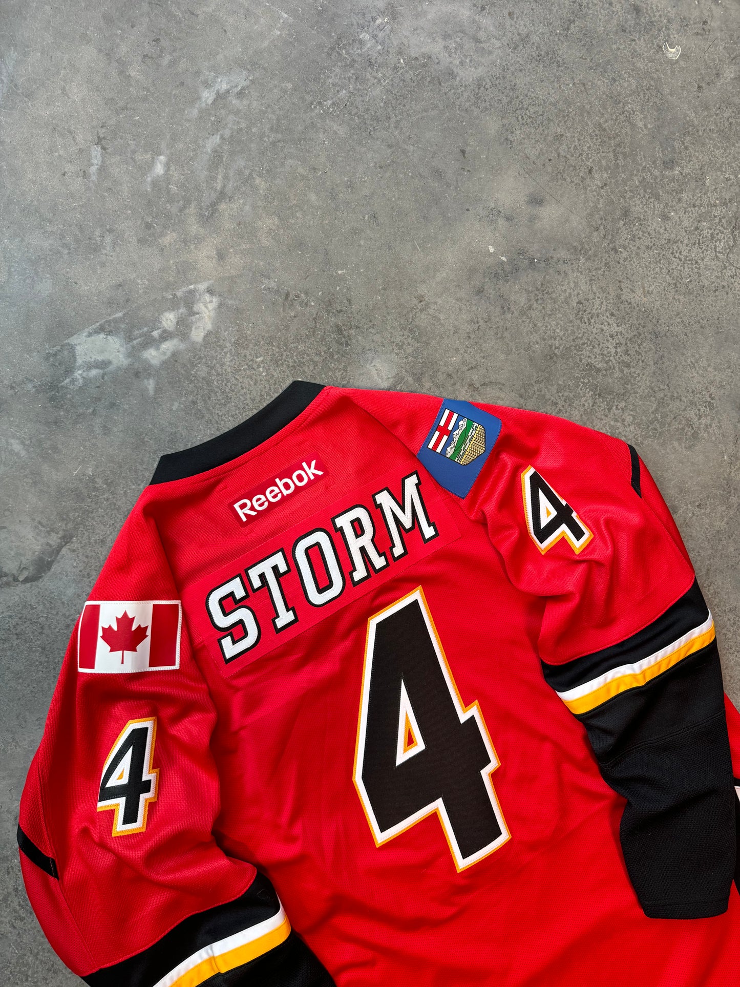 2015 Calgary Flames “Storm” Red Reebok NHL Authentic Fully Embroidered Hockey Jersey (XL)