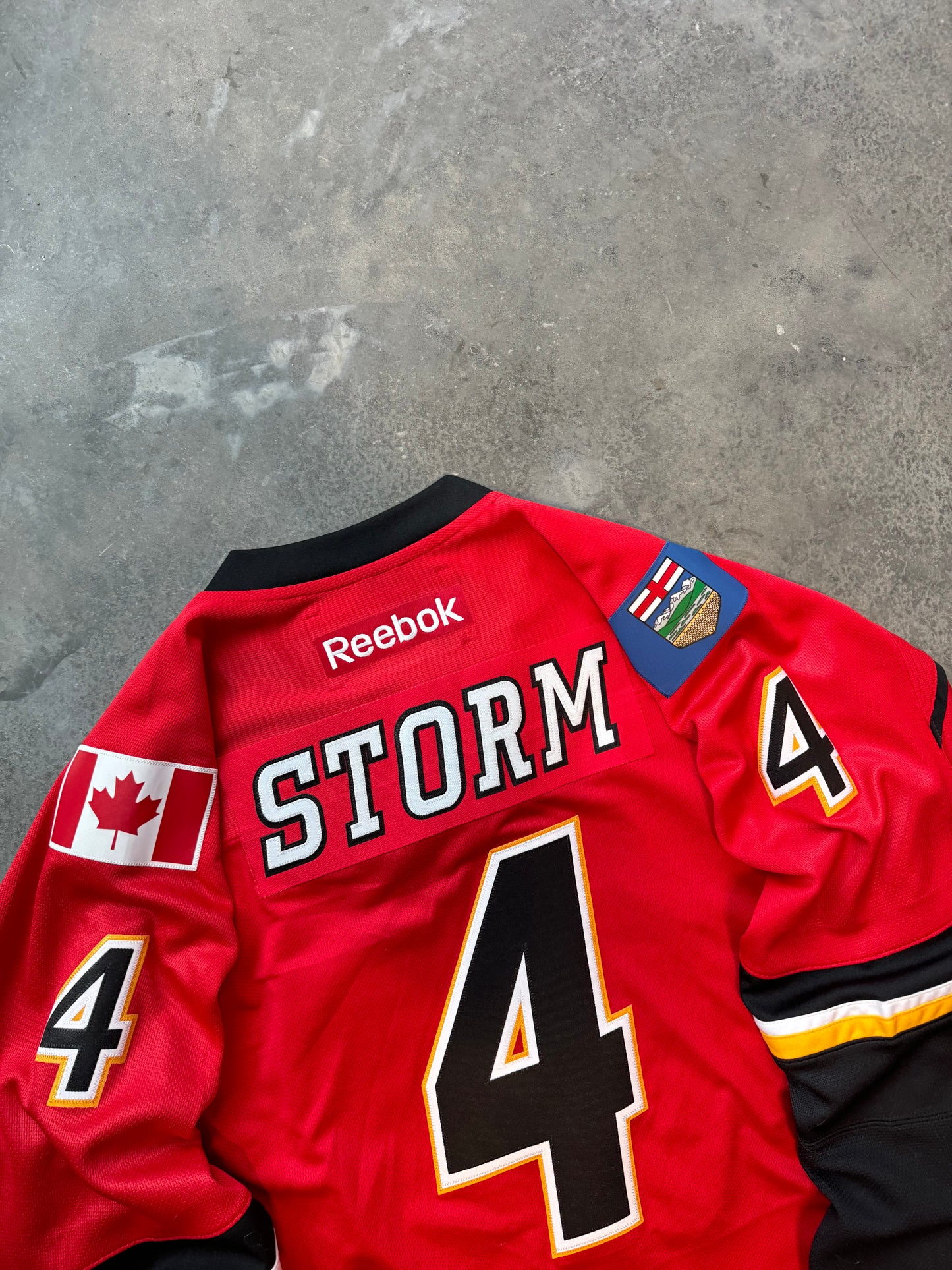 2015 Calgary Flames “Storm” Red Reebok NHL Authentic Fully Embroidered Hockey Jersey (XL)