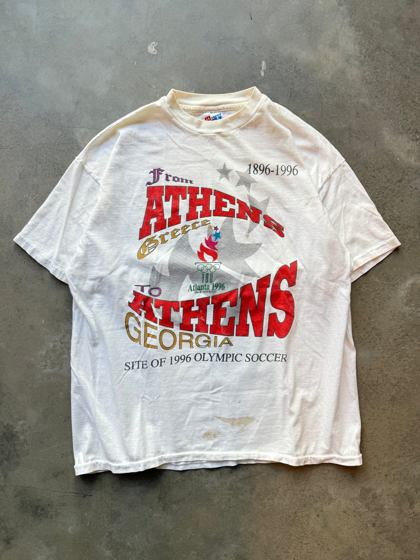 1996 Atlanta “From Athens to Athens”Vintage White Summer Olympics Paint Distressed Tee (XL)