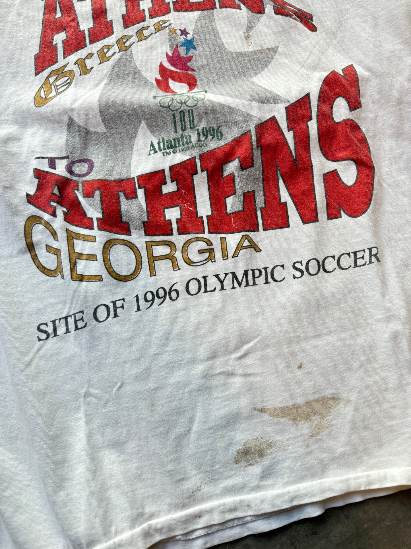 1996 Atlanta “From Athens to Athens”Vintage White Summer Olympics Paint Distressed Tee (XL)