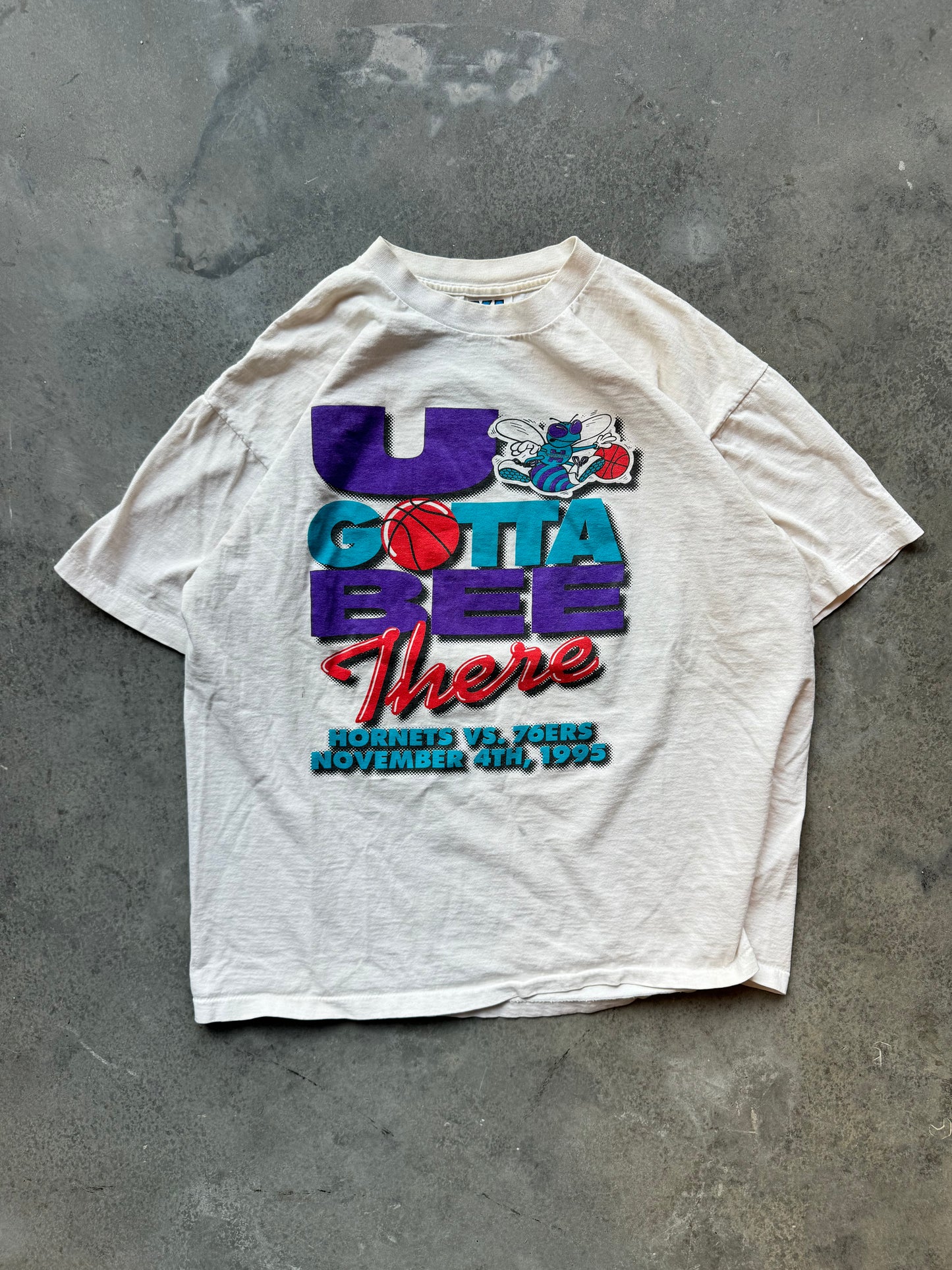 1995 Charlotte Hornets “U Gotta Bee There” vs. Philadelphia 76ers Home Opener Vintage NBA Tee (XL)