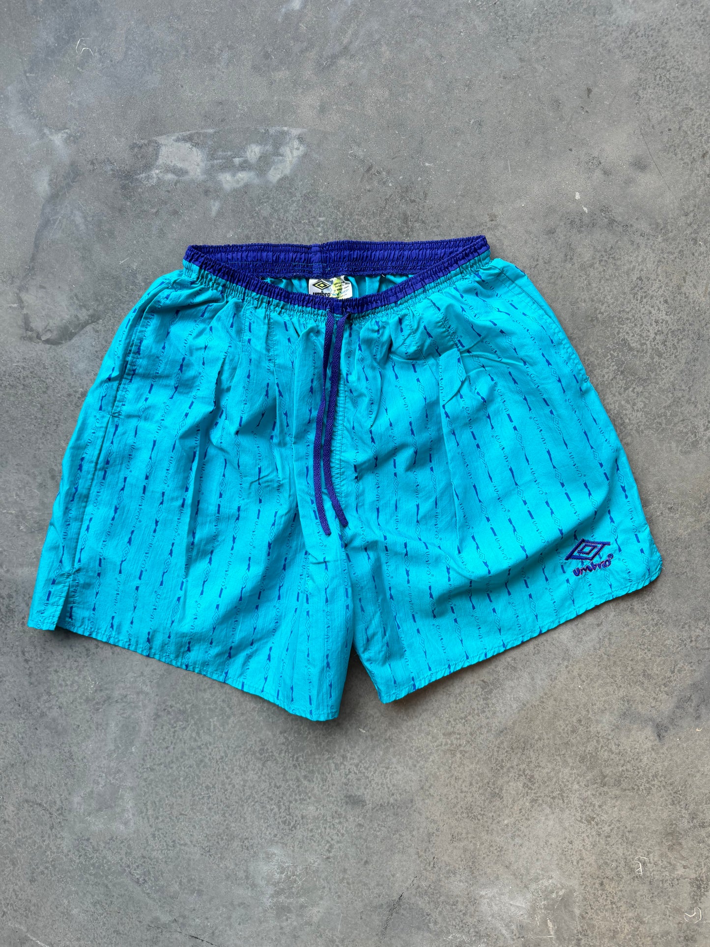 90’s Umbro Vintage Teal/Purple Pinstriped Nylon Shorts (XL)