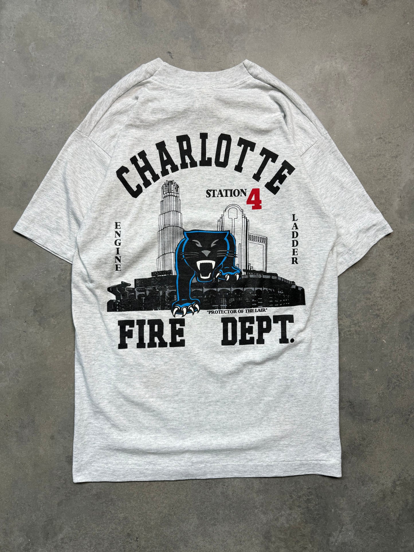 00’s Carolina Panthers x Charlotte Fire Dept Station 4 “Protectors of the Lair” Vintage Heather Grey NFL Tee (Medium)