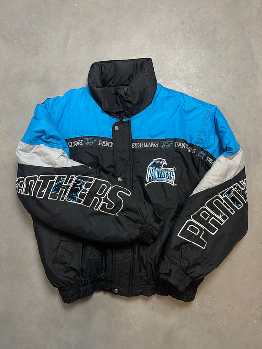 90’s Carolina Panthers Vintage Repeat Logo Spellout NFL Puffer Jacket (XL)