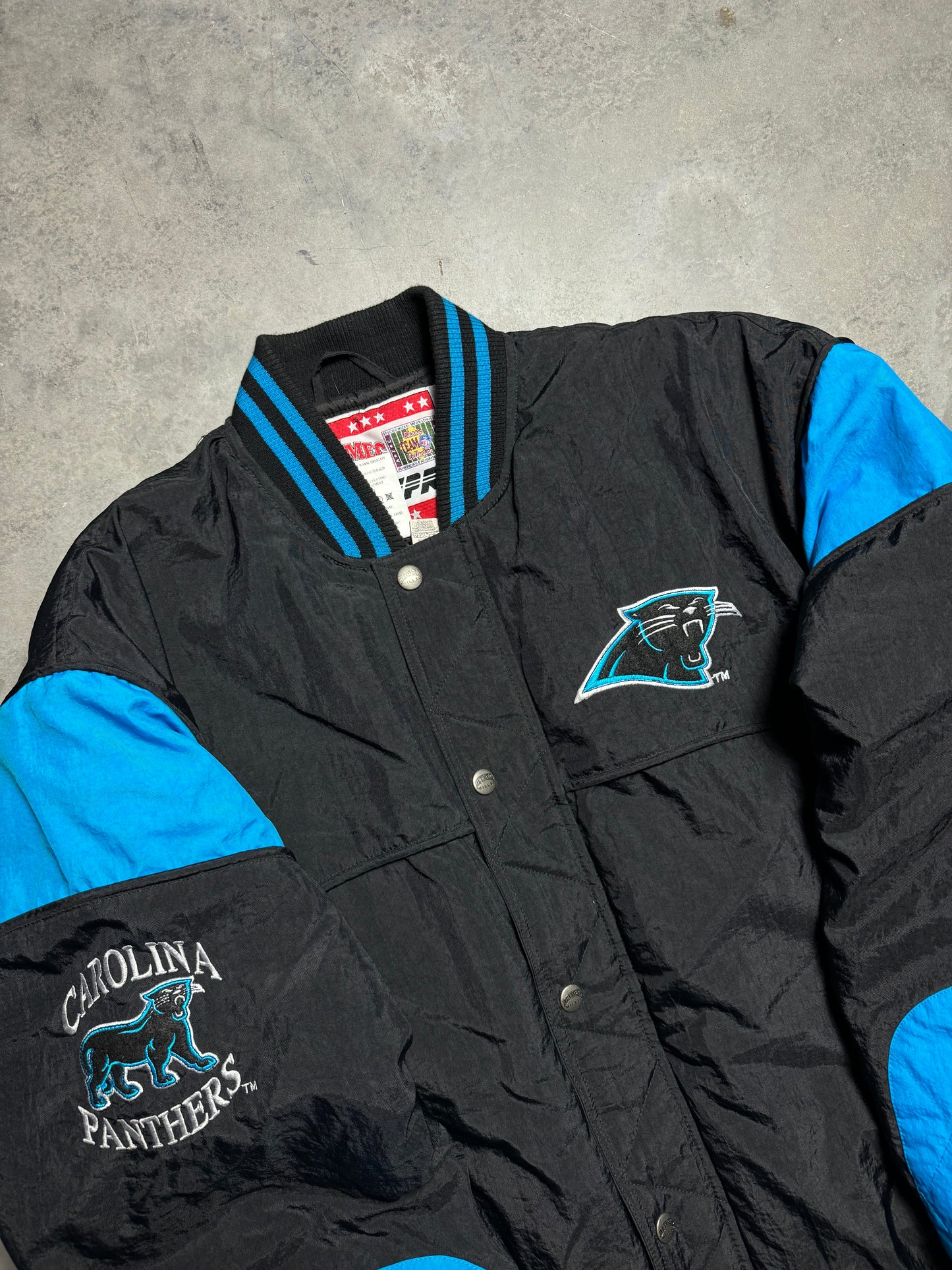 90’s Carolina Panthers Vintage Black Nutmeg Mills Campri Full Cat Alternate Logo NFL Quilted Bomber Nylon Jacket (XL)
