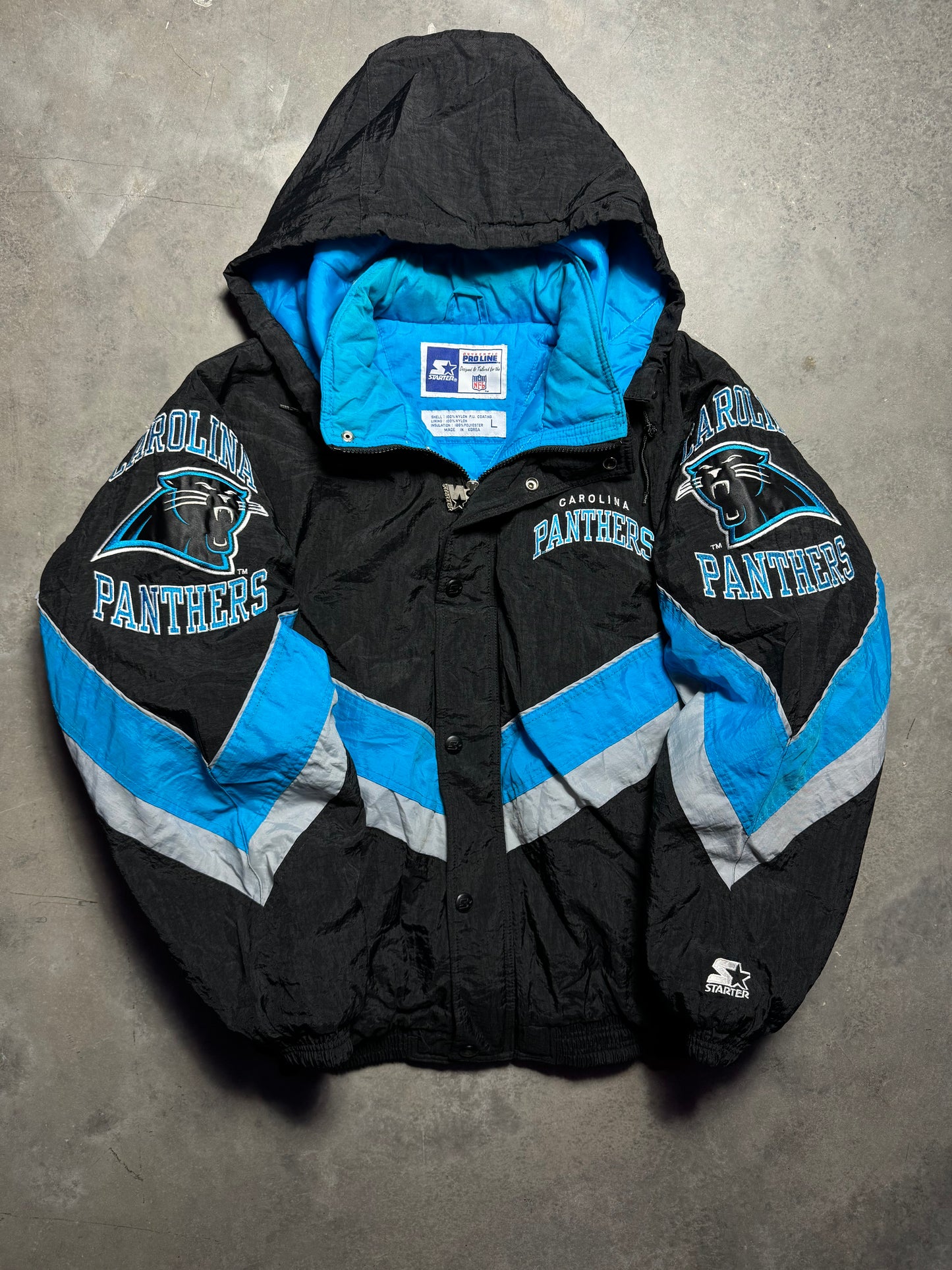 90’s Carolina Panthers Vintage Black Starter Big Shoulder Logos NFL Puffer Jacket (Large)