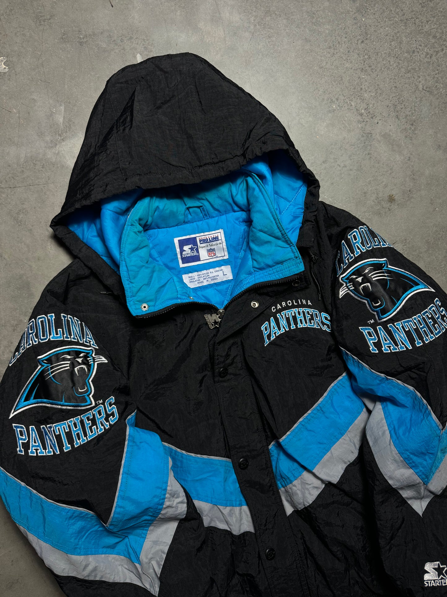 90’s Carolina Panthers Vintage Black Starter Big Shoulder Logos NFL Puffer Jacket (Large)