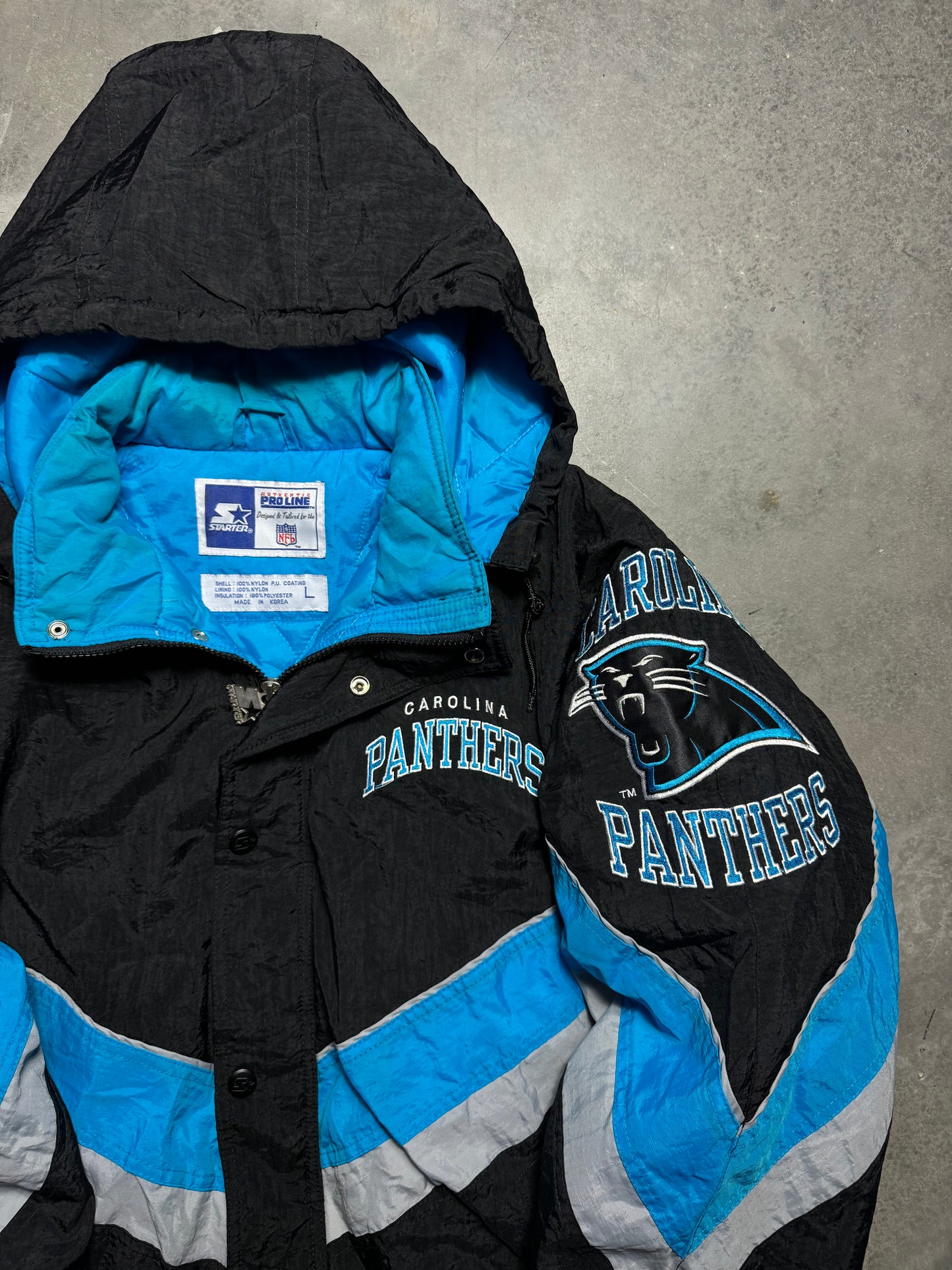 90’s Carolina Panthers Vintage Black Starter Big Shoulder Logos NFL Puffer Jacket (Large)