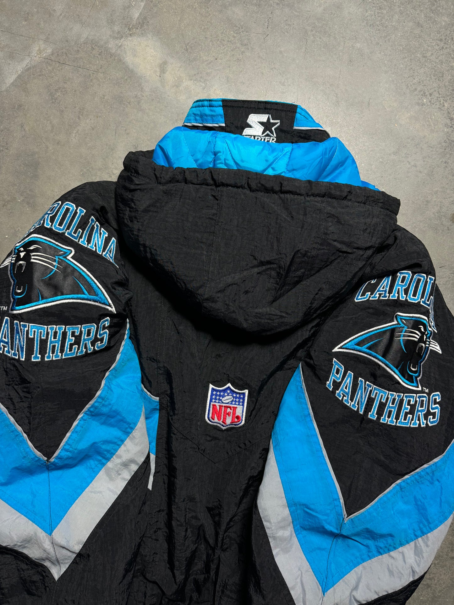 90’s Carolina Panthers Vintage Black Starter Big Shoulder Logos NFL Puffer Jacket (Large)