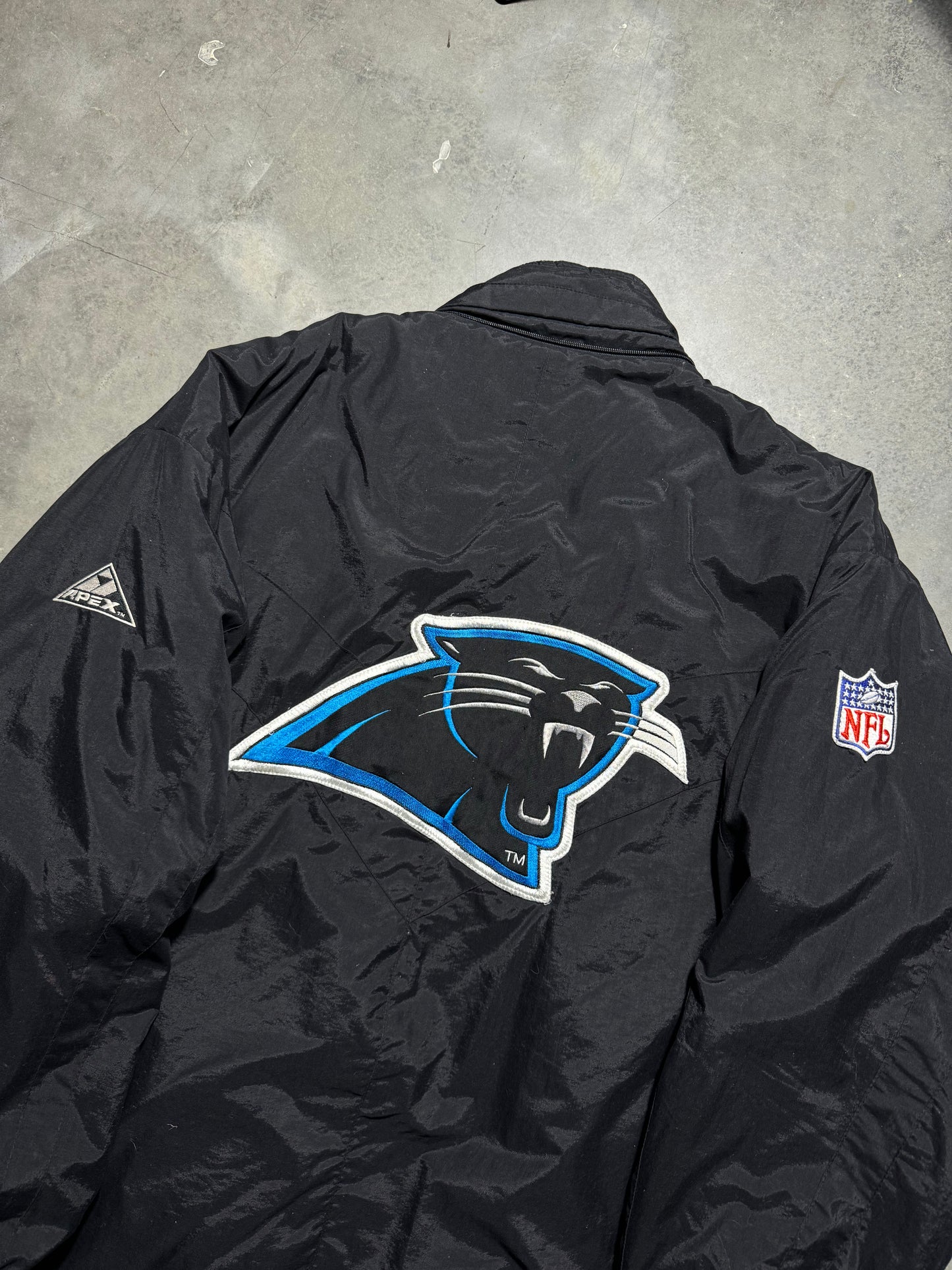 90’s Carolina Panthers Vintage Black Apex One Big Logo NFL Sideline Trench Puffer Jacket (XL)