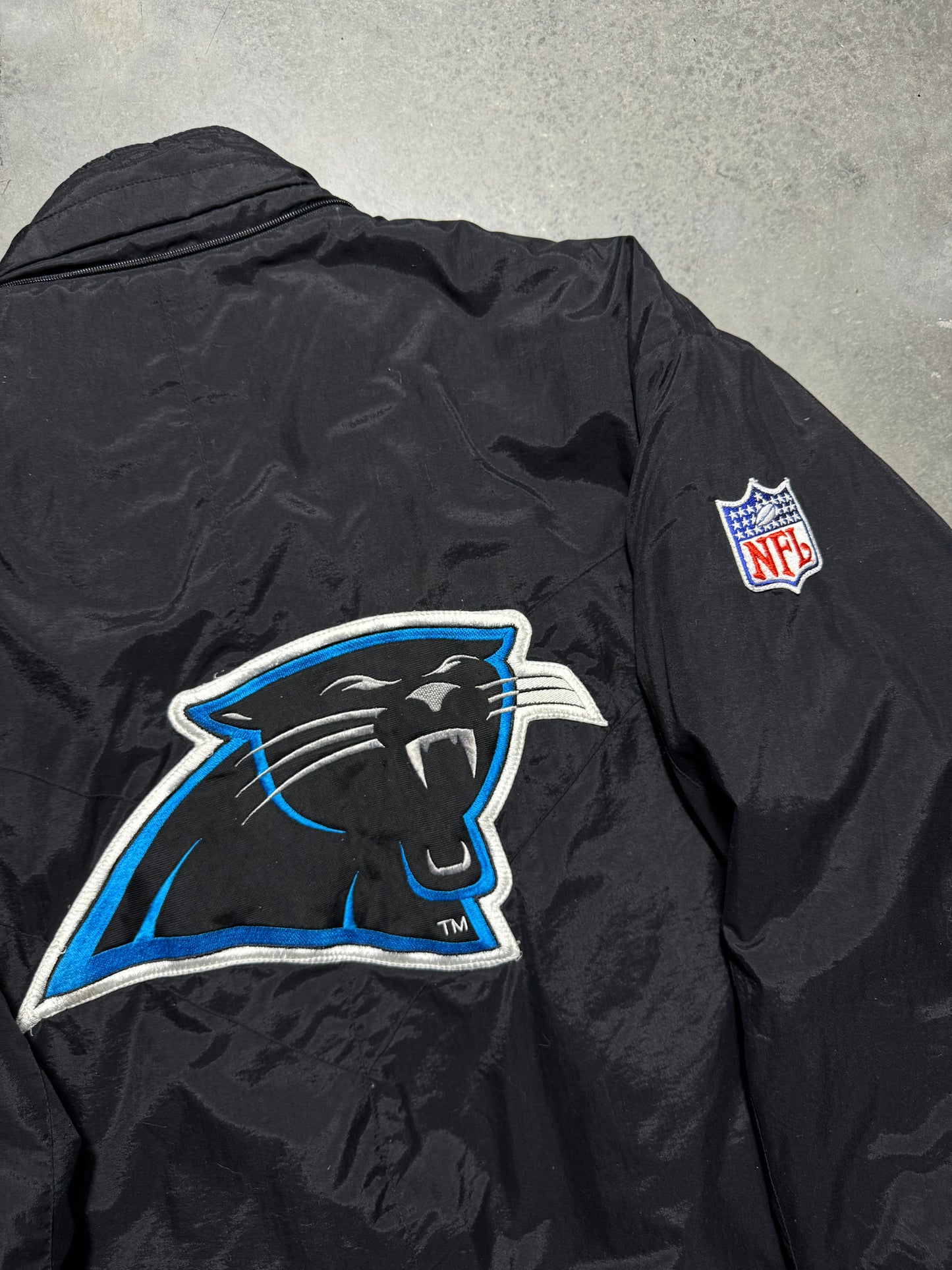 90’s Carolina Panthers Vintage Black Apex One Big Logo NFL Sideline Trench Puffer Jacket (XL)