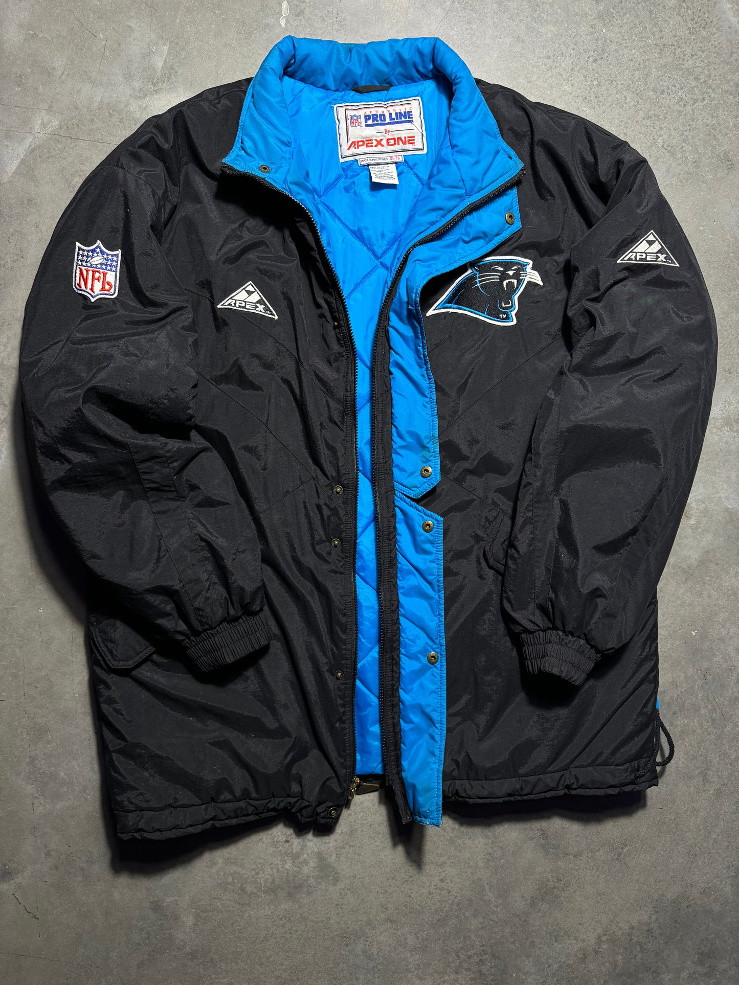 90’s Carolina Panthers Vintage Black Apex One Big Logo NFL Sideline Trench Puffer Jacket (XL)