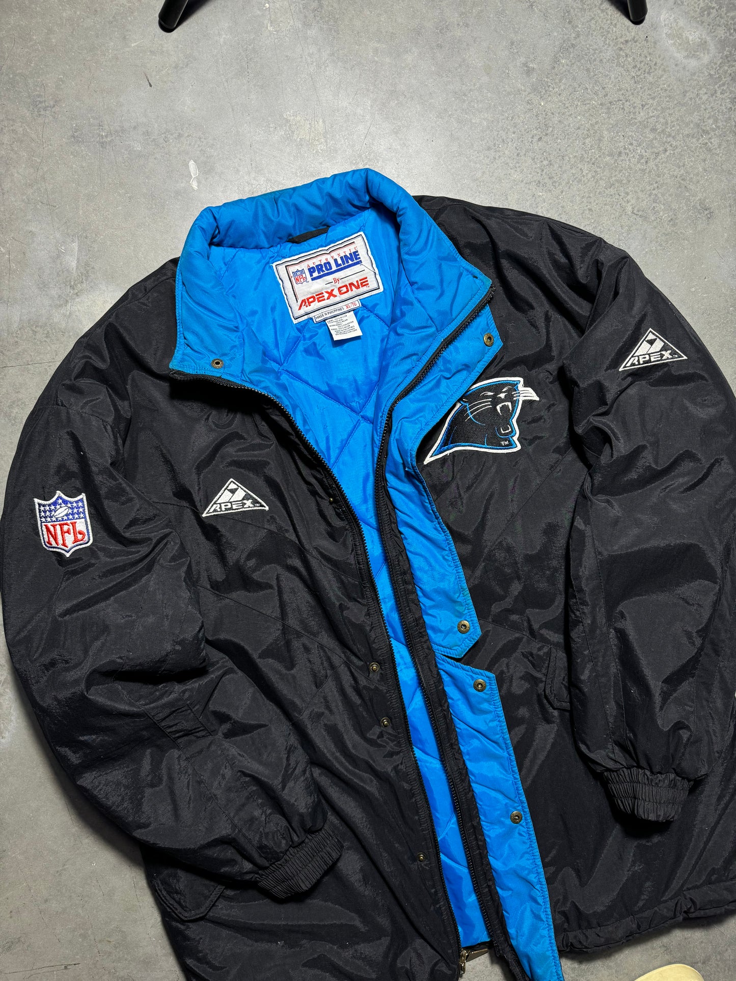 90’s Carolina Panthers Vintage Black Apex One Big Logo NFL Sideline Trench Puffer Jacket (XL)