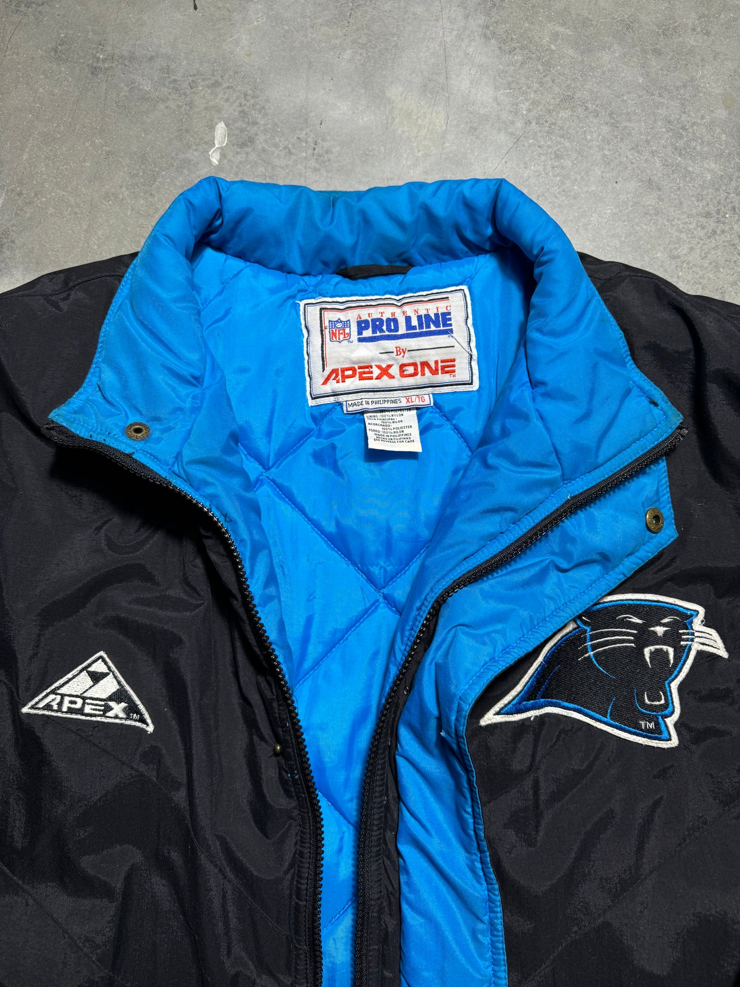 90’s Carolina Panthers Vintage Black Apex One Big Logo NFL Sideline Trench Puffer Jacket (XL)