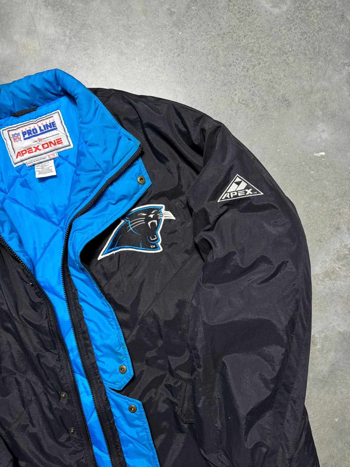 90’s Carolina Panthers Vintage Black Apex One Big Logo NFL Sideline Trench Puffer Jacket (XL)