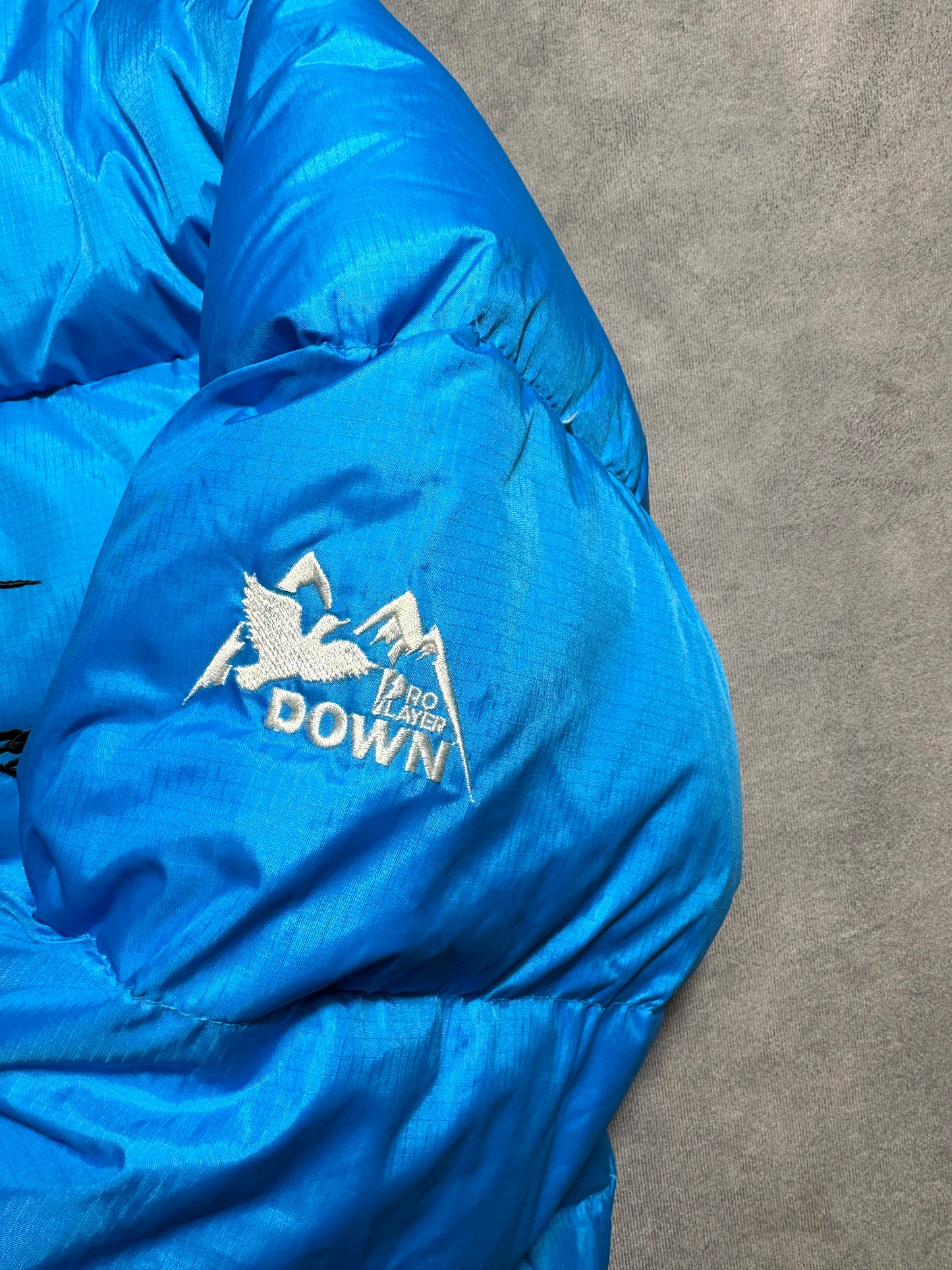 90’s Carolina Panthers Vintage Blue Cat Scratch Font Pro Player Down Bubble NFL Jacket - Deadstock (Medium)