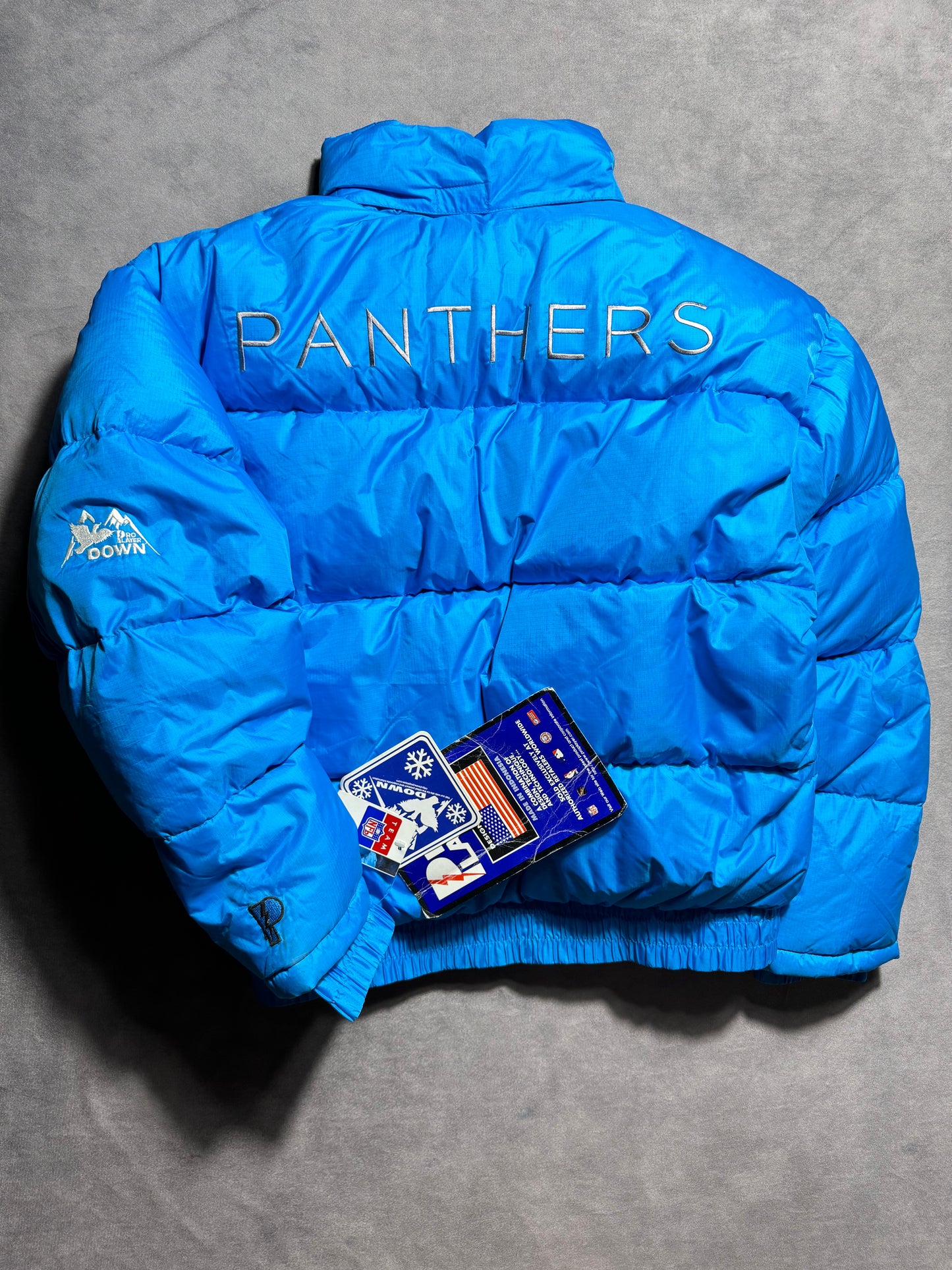 90’s Carolina Panthers Vintage Blue Cat Scratch Font Pro Player Down Bubble NFL Jacket - Deadstock (Medium)