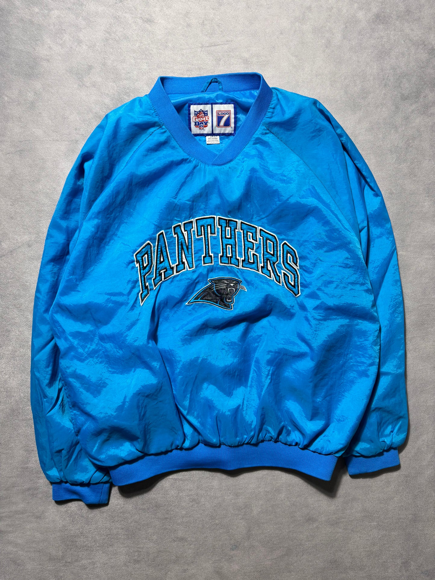 90’s Carolina Panthers Vintage Blue Logo 7 Embroidered Sideline Style NFL Windbreaker Pullover Jacket (Large)