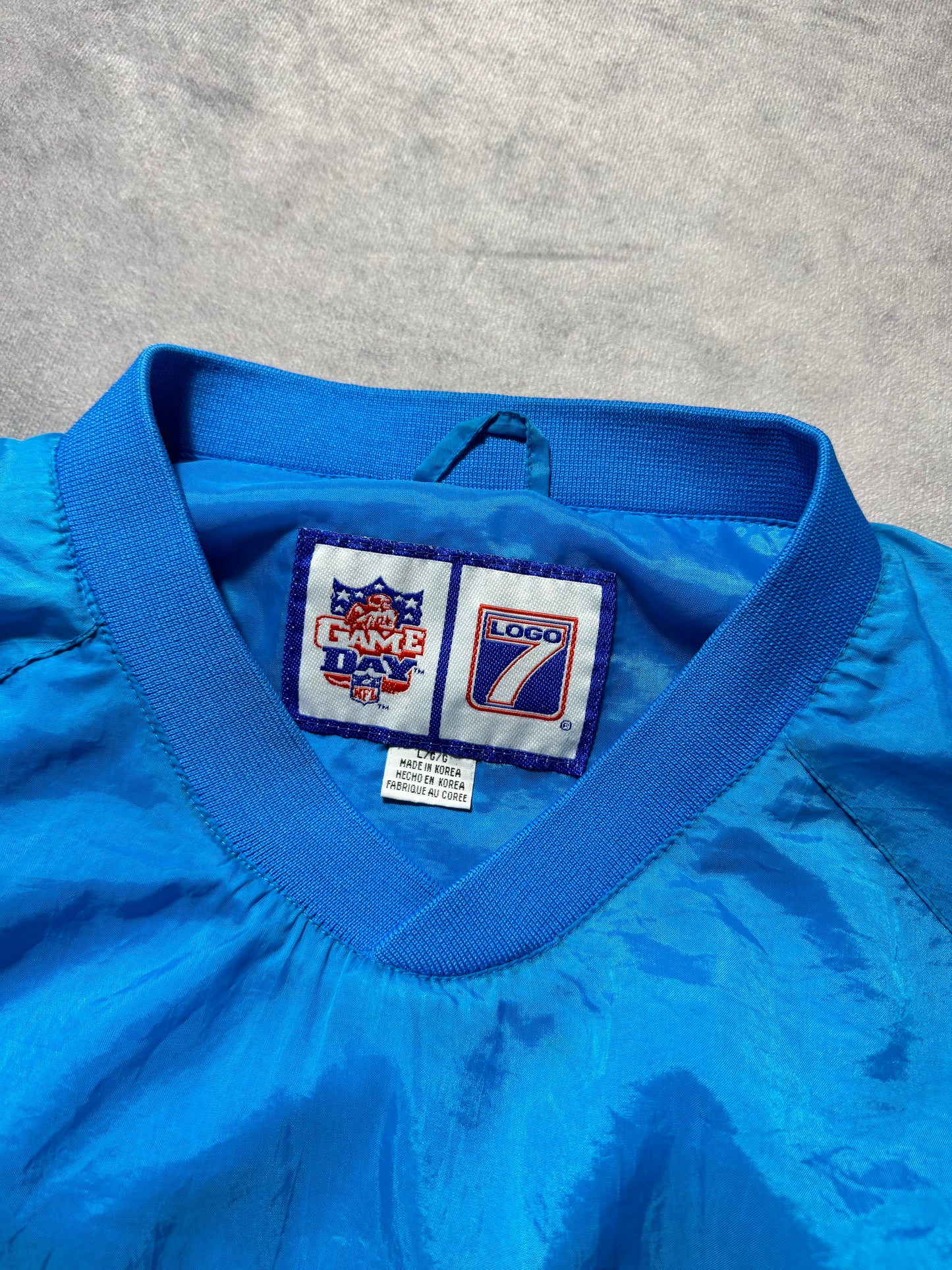 90’s Carolina Panthers Vintage Blue Logo 7 Embroidered Sideline Style NFL Windbreaker Pullover Jacket (Large)