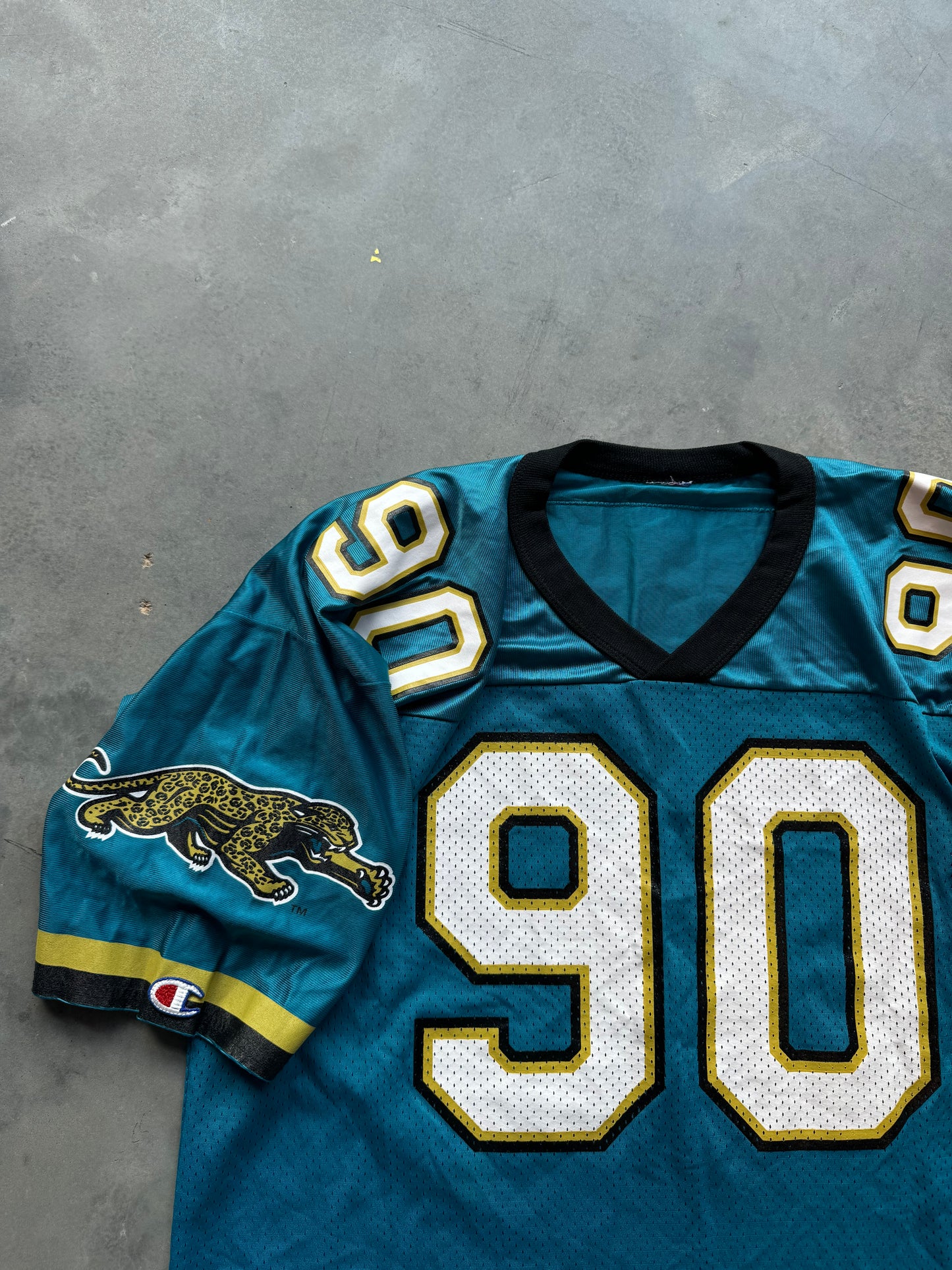 90’s Jacksonville Jaguars Tony Brackens Vintage Champion Teal Prowler Logo NFL Jersey (48/XL)