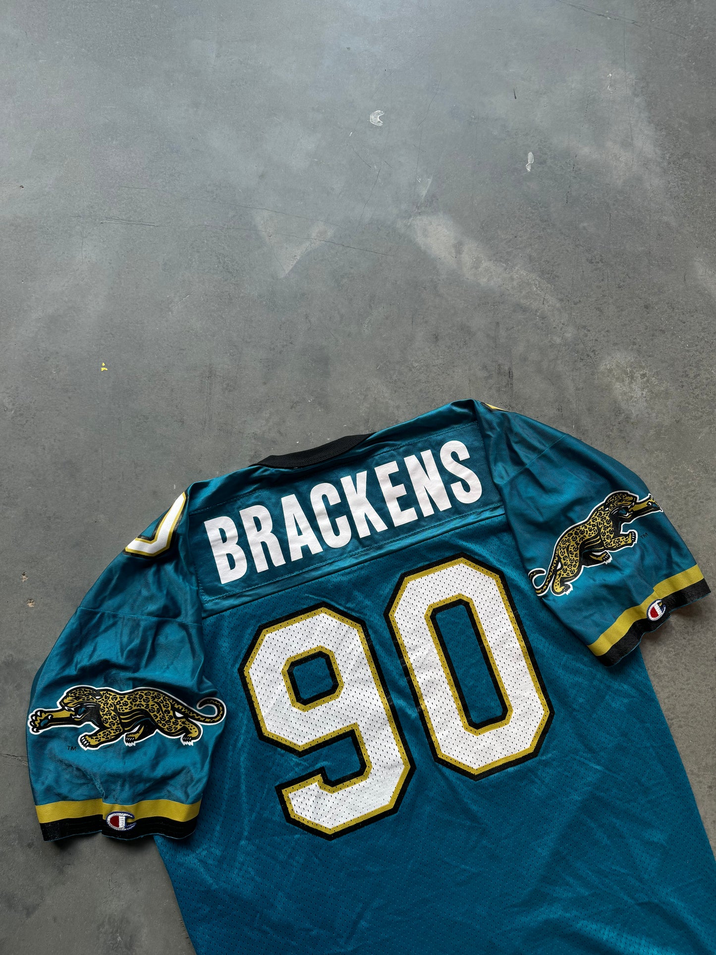 90’s Jacksonville Jaguars Tony Brackens Vintage Champion Teal Prowler Logo NFL Jersey (48/XL)