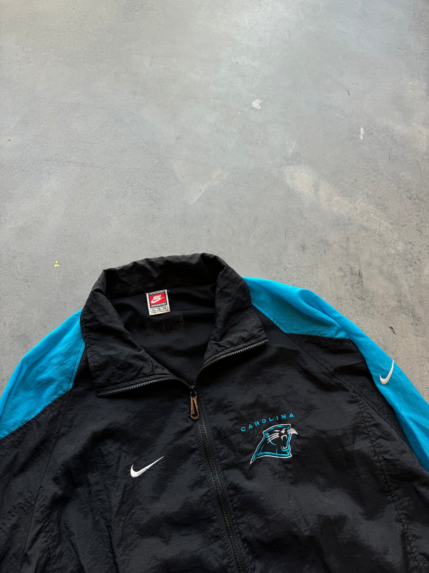 90’s Carolina Panthers Vintage Nike Team Sports NFL Pro Line Windbreaker Jacket (XL)