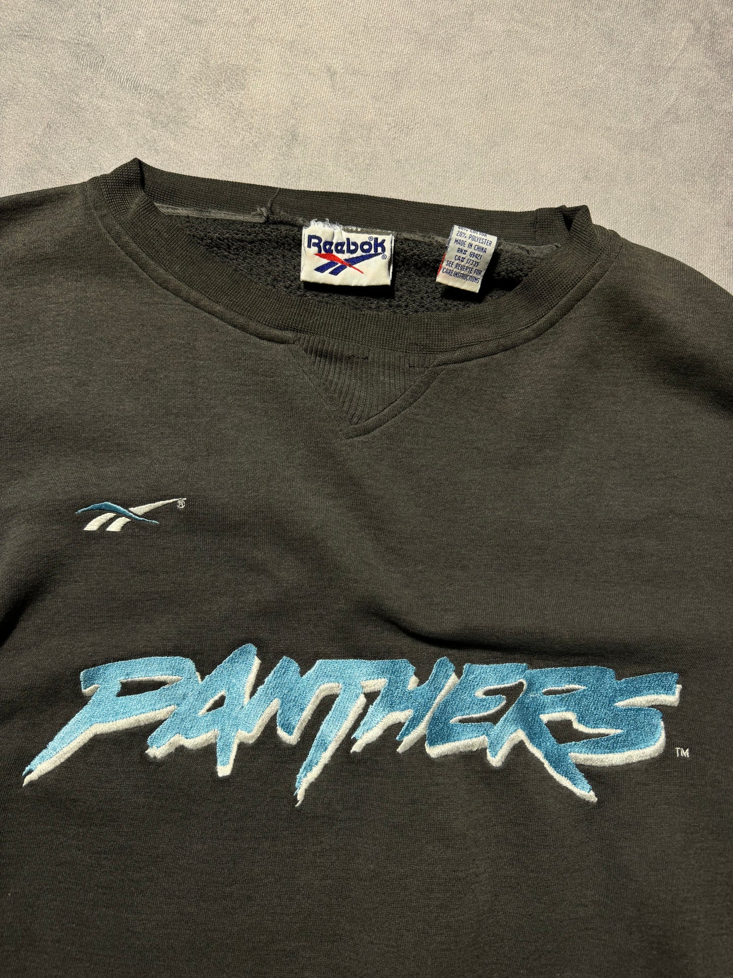 1995 Carolina Panthers Vintage Faded Black Reebok Embroidered Cat Scratch Font NFL Crewneck (XXL)