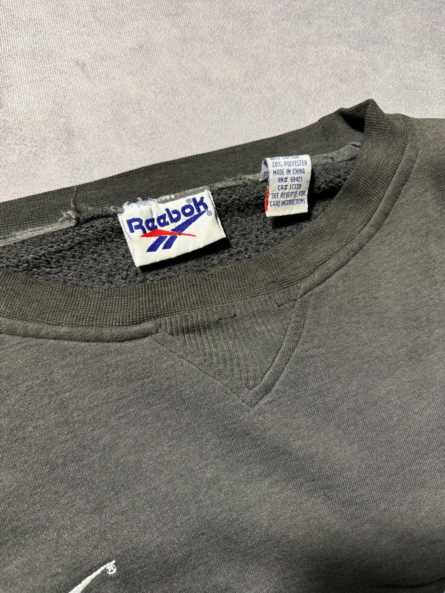 1995 Carolina Panthers Vintage Faded Black Reebok Embroidered Cat Scratch Font NFL Crewneck (XXL)