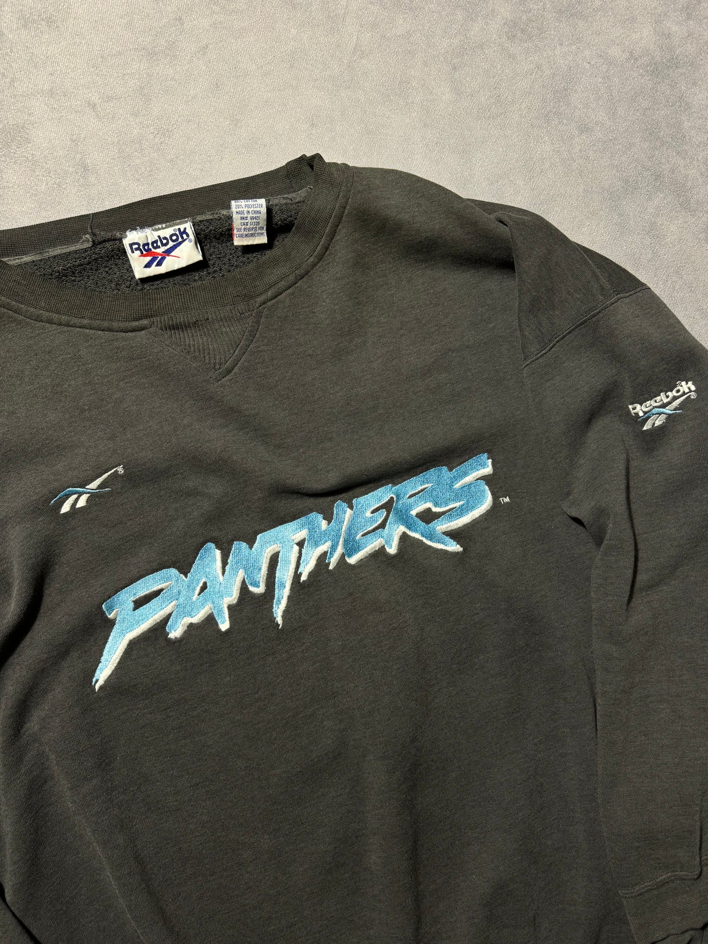 1995 Carolina Panthers Vintage Faded Black Reebok Embroidered Cat Scratch Font NFL Crewneck (XXL)
