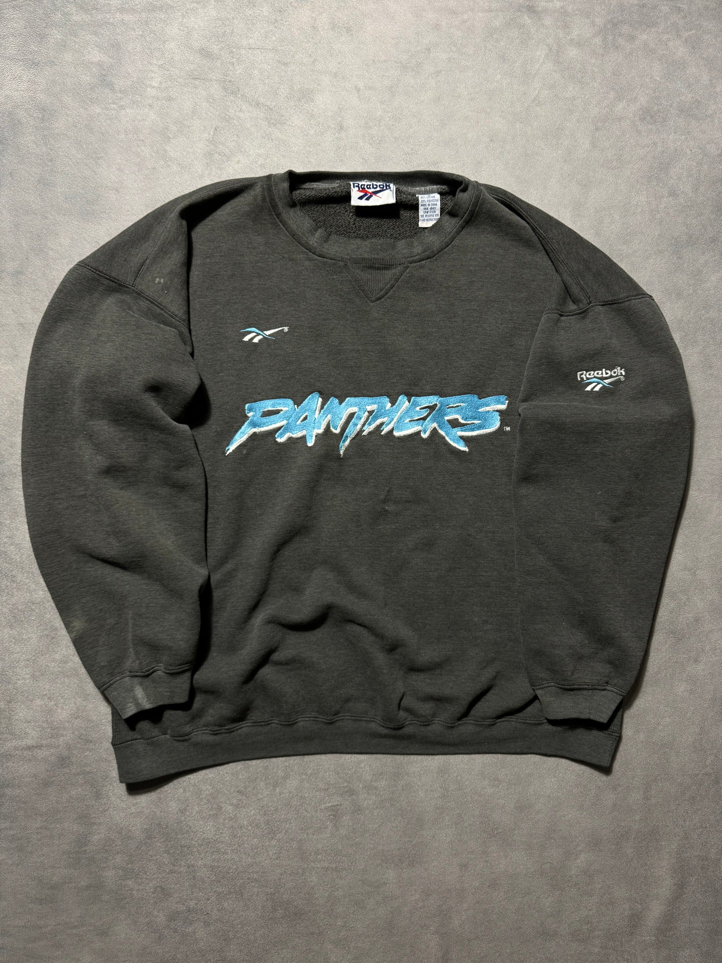 1995 Carolina Panthers Vintage Faded Black Reebok Embroidered Cat Scratch Font NFL Crewneck (Large)