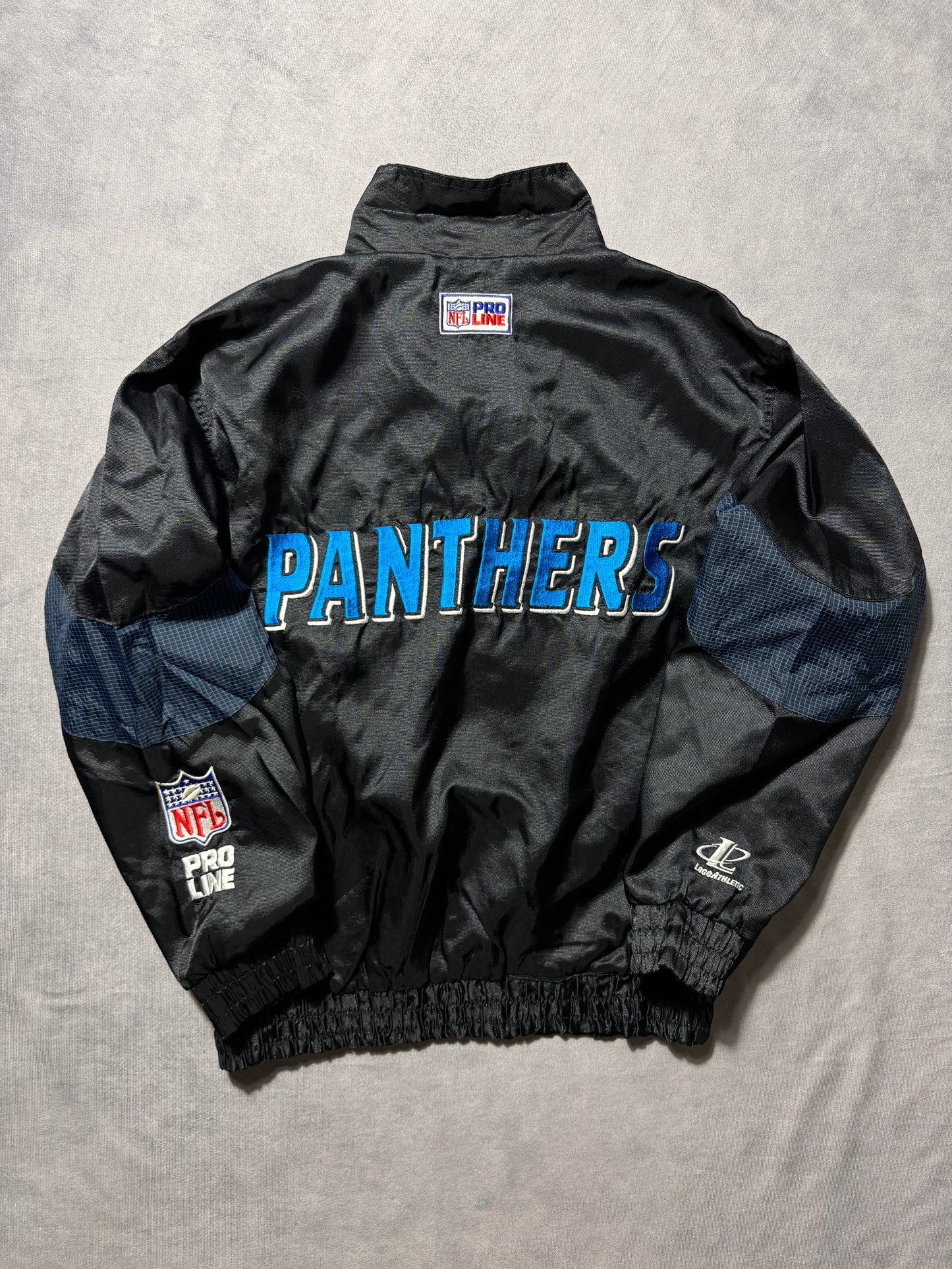 90’s Carolina Panthers Vintage Black Logo Athletic Multi Logo Embroidered NFL Windbreaker Jacket (Medium)
