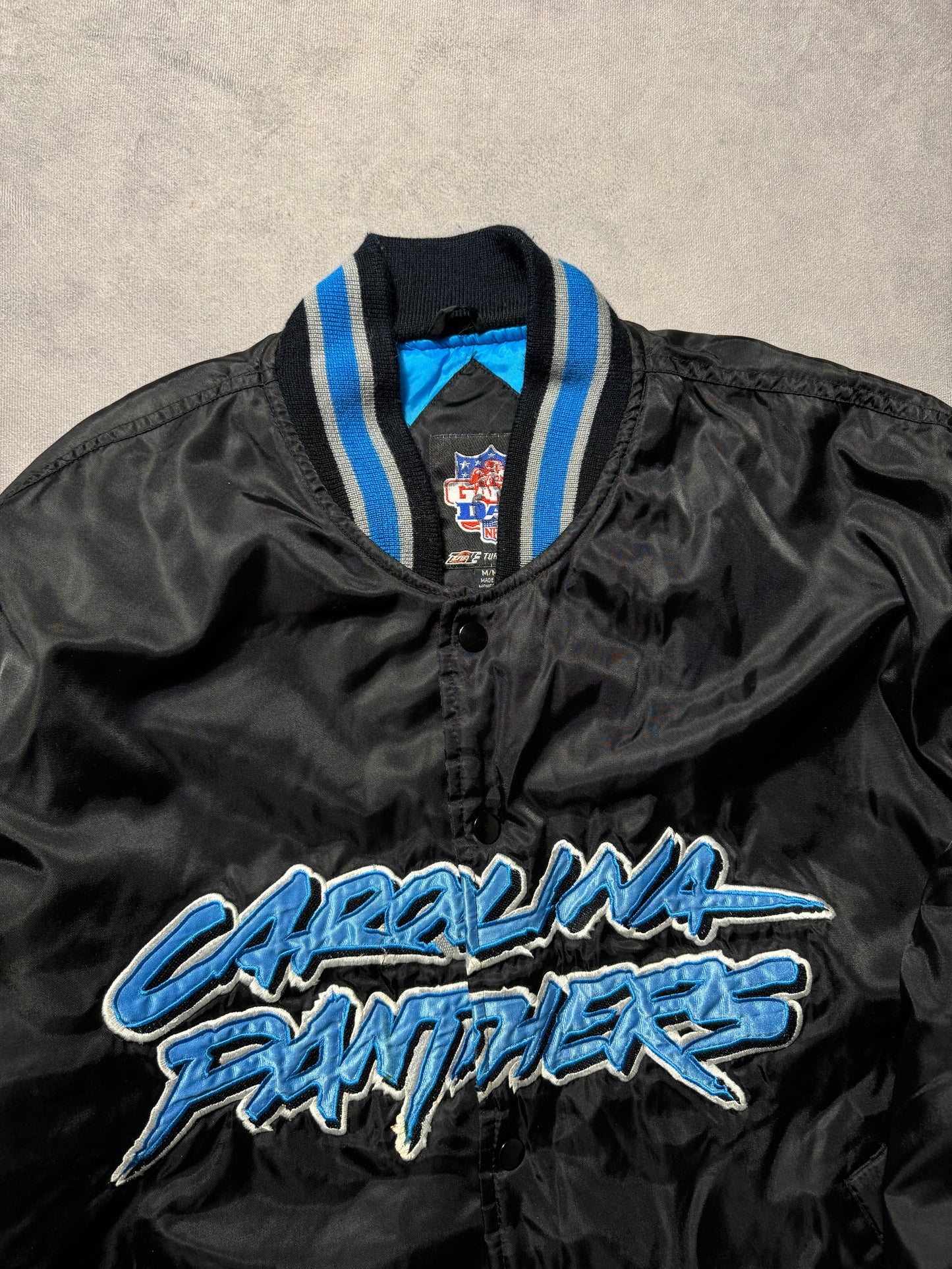 00’s Carolina Panthers Vintage Black Big Cat Scratch Font Spellout Embroidered NFL Satin Jacket (Large)