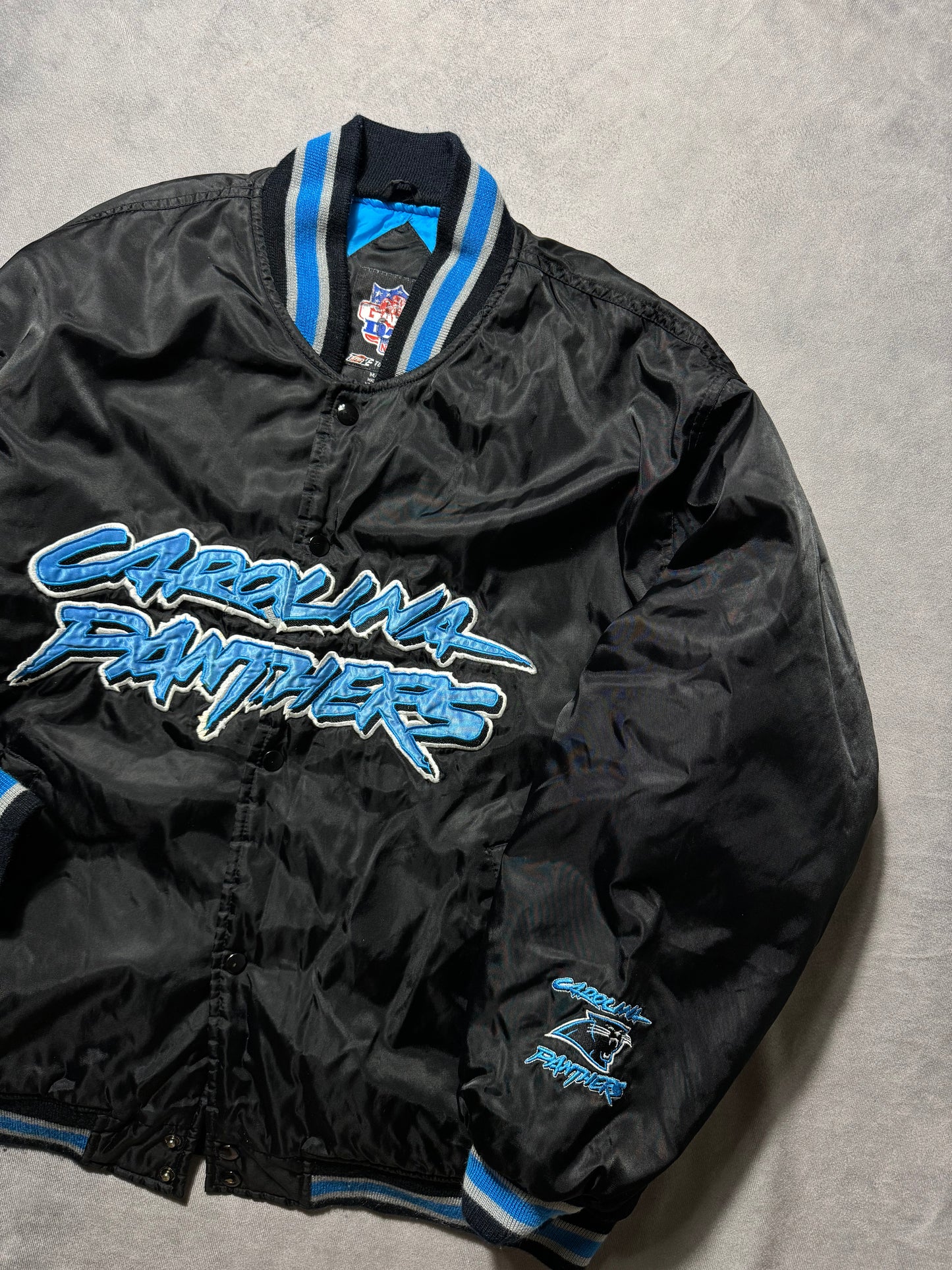 00’s Carolina Panthers Vintage Black Big Cat Scratch Font Spellout Embroidered NFL Satin Jacket (Large)