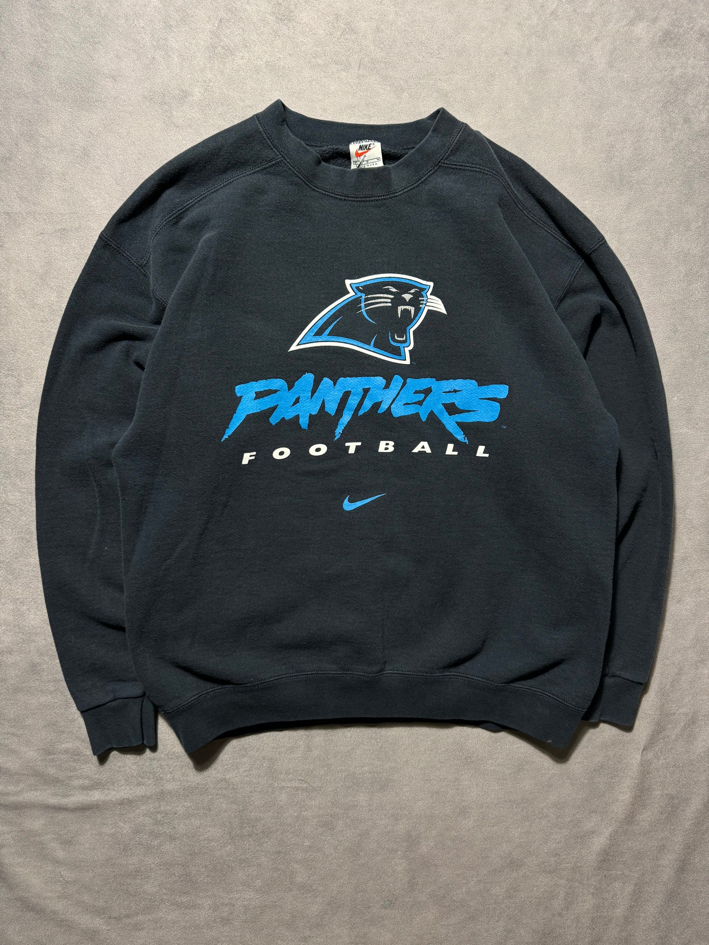 1999 Carolina Panthers Vintage Black Nike Cat Scratch Font Big Logo NFL Crewneck (Medium)