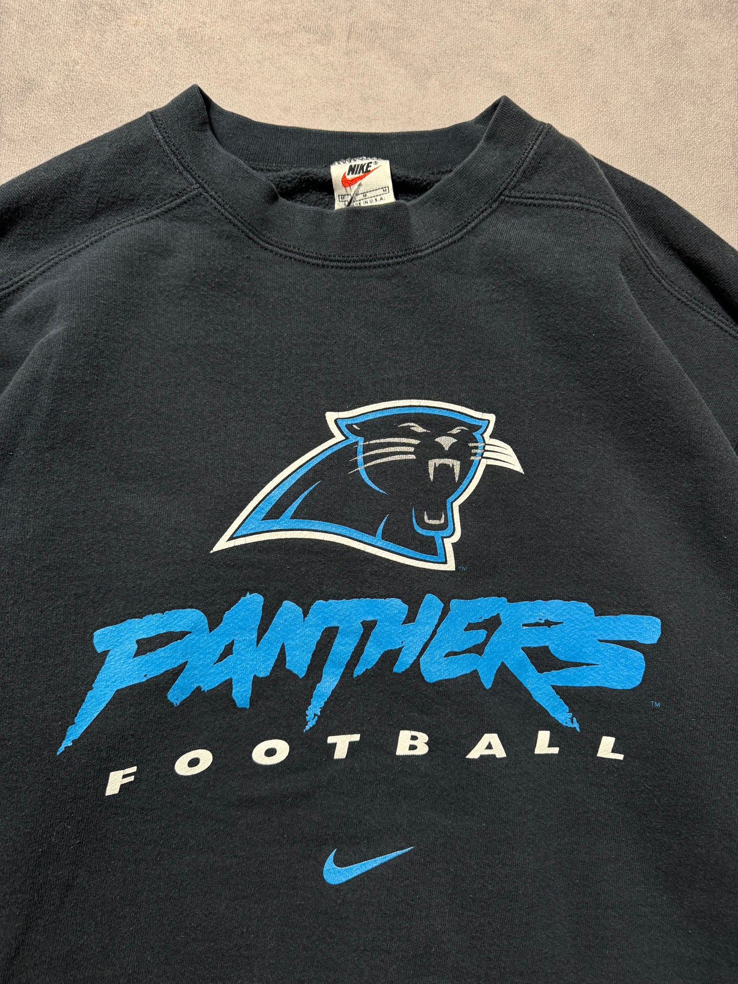 1999 Carolina Panthers Vintage Black Nike Cat Scratch Font Big Logo NFL Crewneck (Medium)