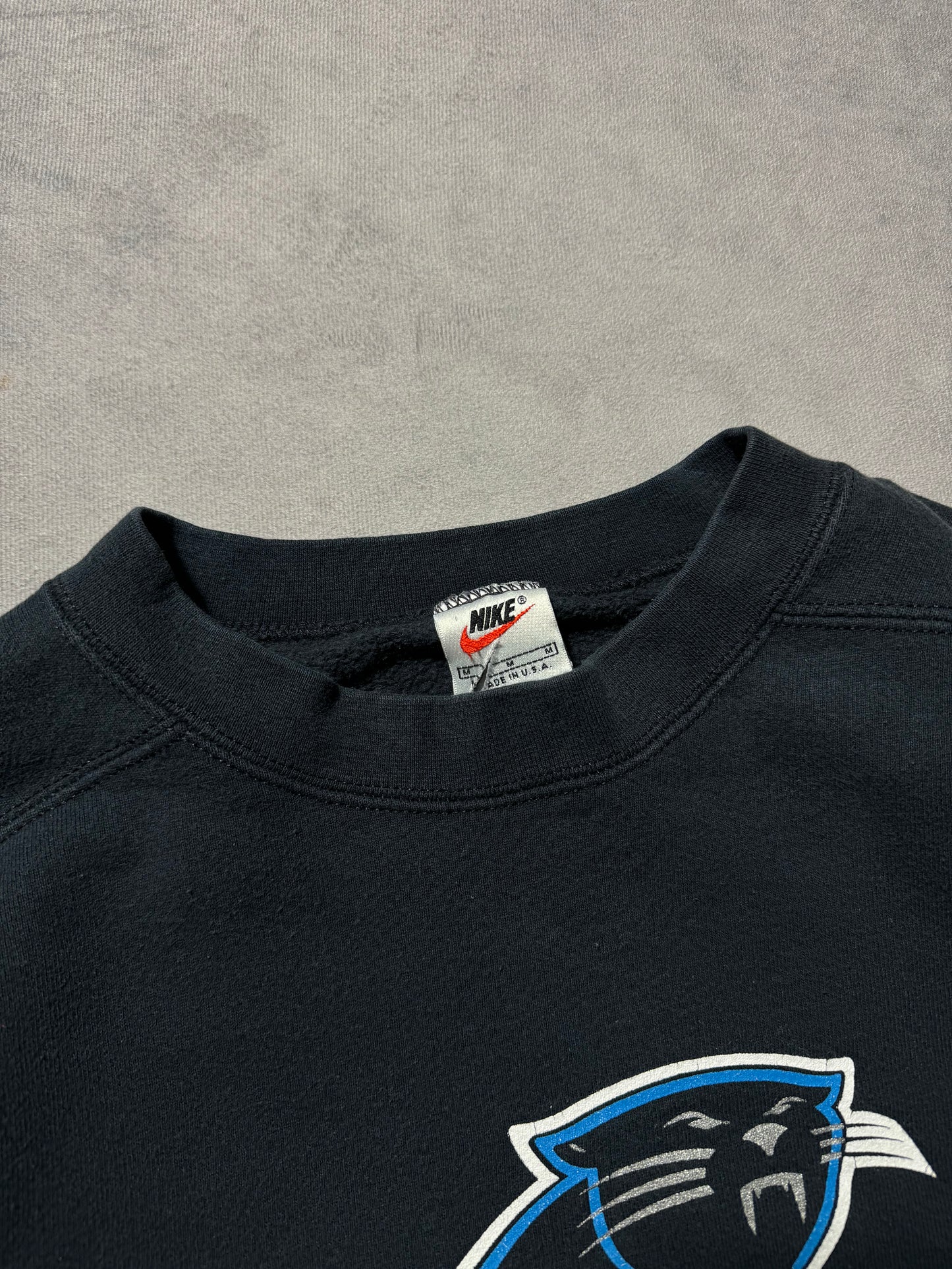 1999 Carolina Panthers Vintage Black Nike Cat Scratch Font Big Logo NFL Crewneck (Medium)