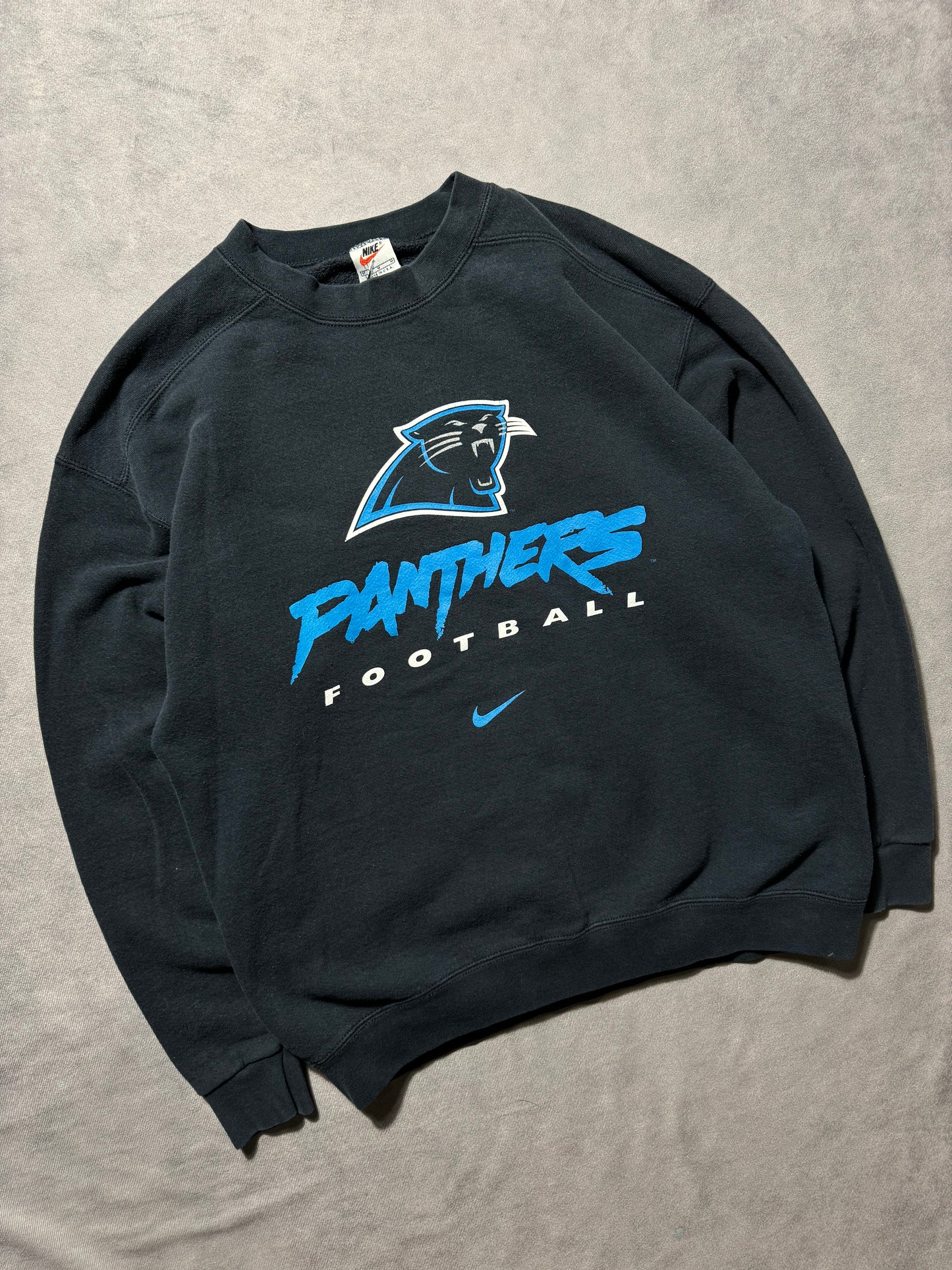 1999 Carolina Panthers Vintage Black Nike Cat Scratch Font Big Logo NFL Crewneck (Medium)