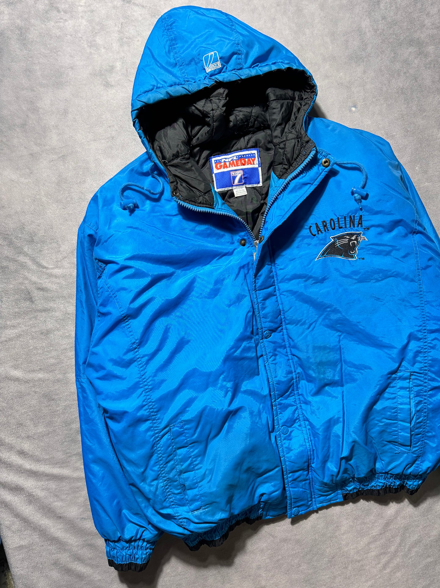 90’s Carolina Panthers Vintage Alternate Blue Logo 7 Game Day Embroidered NFL Puffer Jacket (XL)