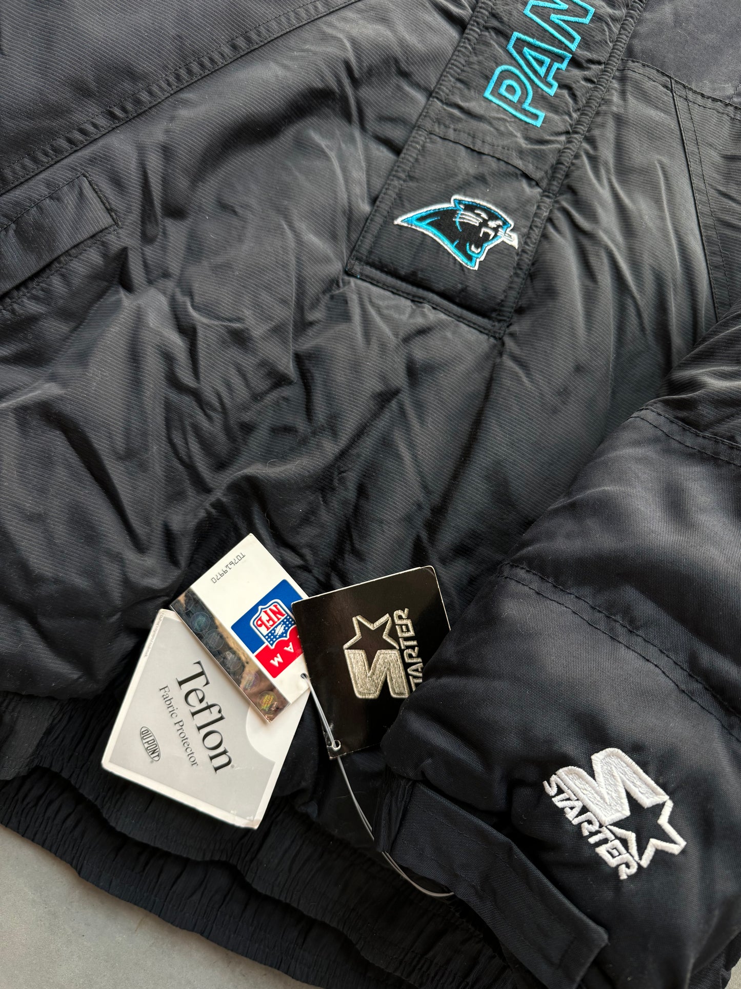 1995 Carolina Panthers Vintage Starter Big Logo Wordmark Half Zip NFL Puffer Jacket - Deadstock (Medium)