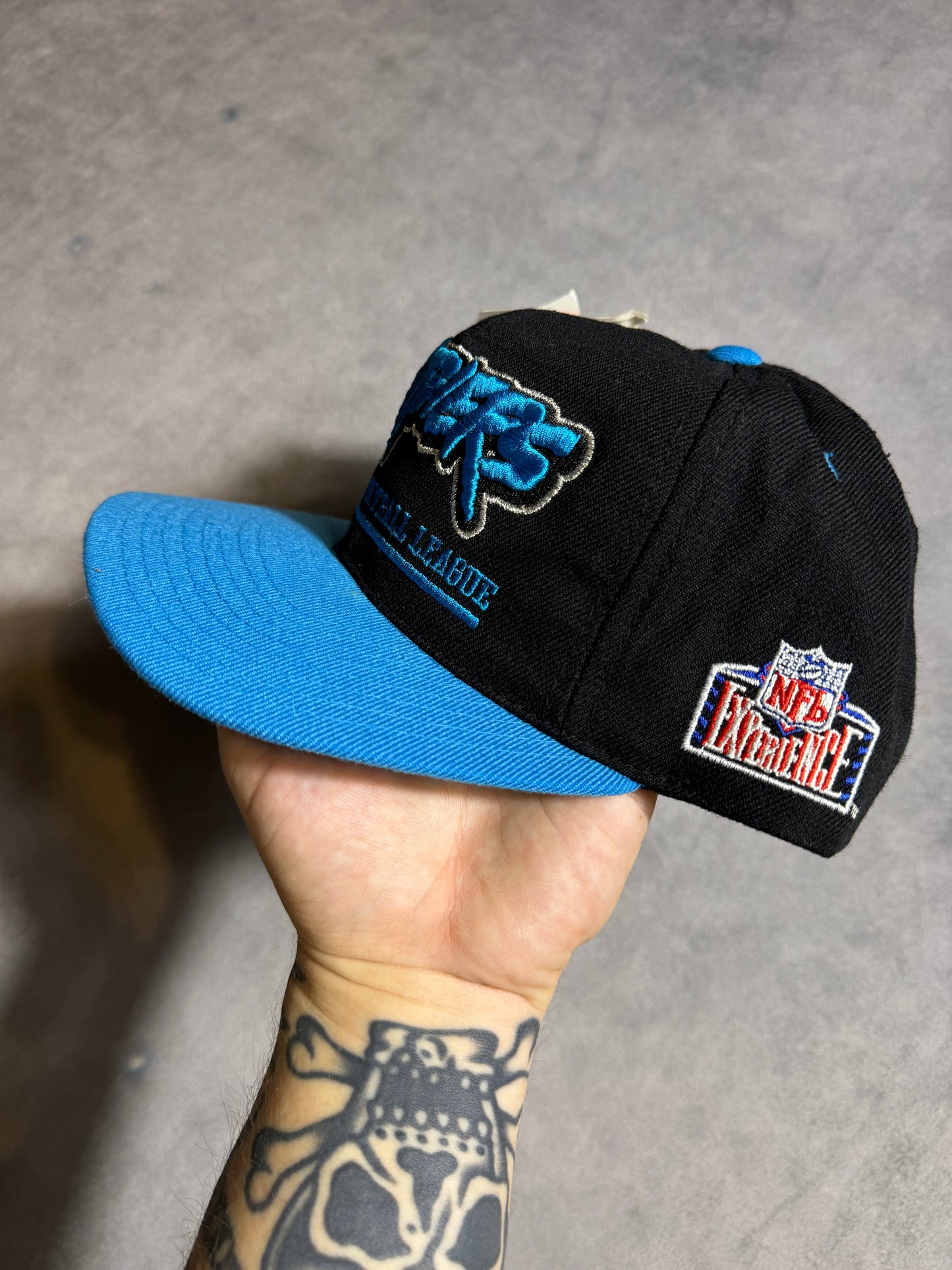 90’s Carolina Panthers Vintage Pro Player Multi Logo Cat Scratch Font Silver Metallic Stitching NFL Snapbacj Hat - Deadstock (OSFA)