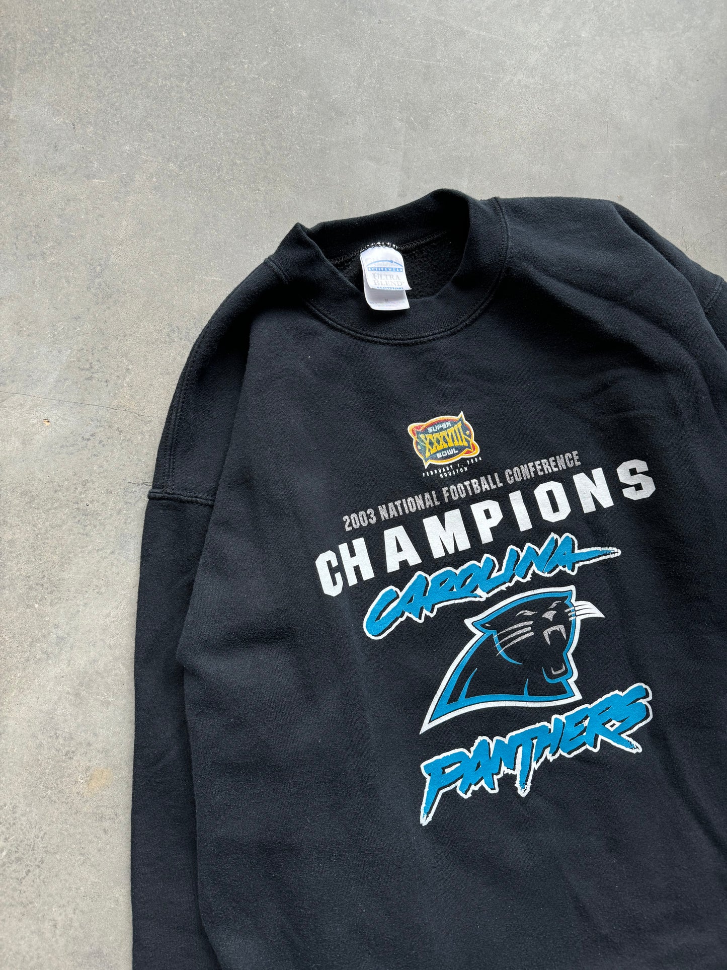 2003 Carolina Panthers Vintage NFC Champions Super Bowl XXXVIII Cat Scratch Font Cropped NFL Crewneck (Medium)