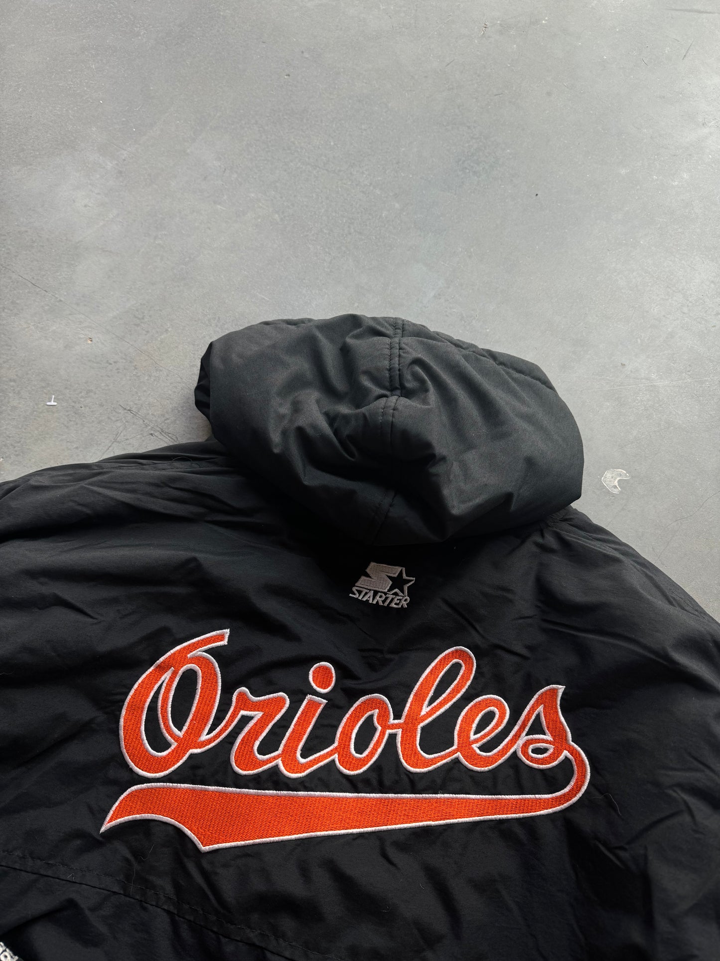 90’s Baltimore Orioles Vintage Black MLB Script Tailsweep Starter Puffer Jacket (XL)