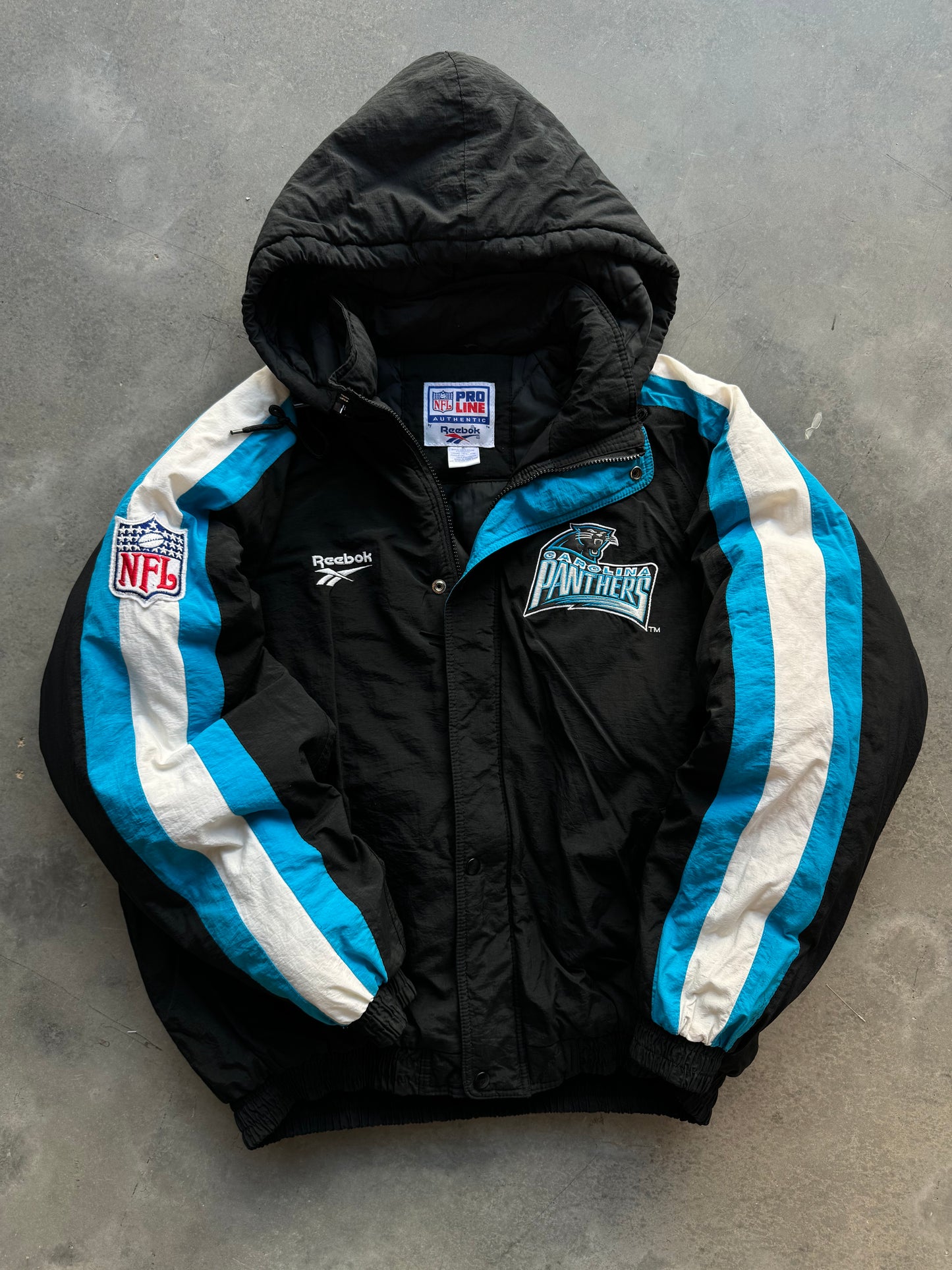 1995 Carolina Panthers Vintage Reebok NFL Pro Line Sleeve Striped Puffet Jacket (XL)