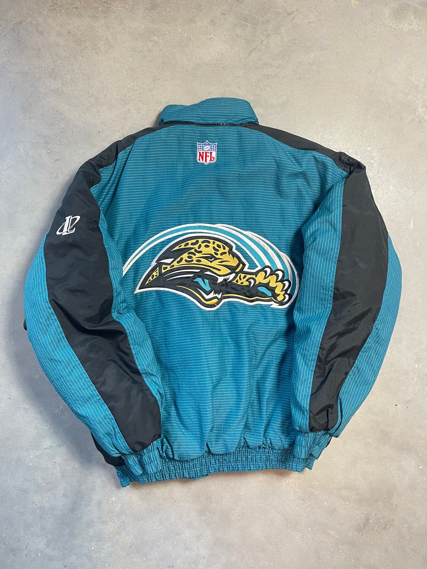 90’s Jacksonville Jaguars Vintage Logo Athletic NFL Puffer Jacket (