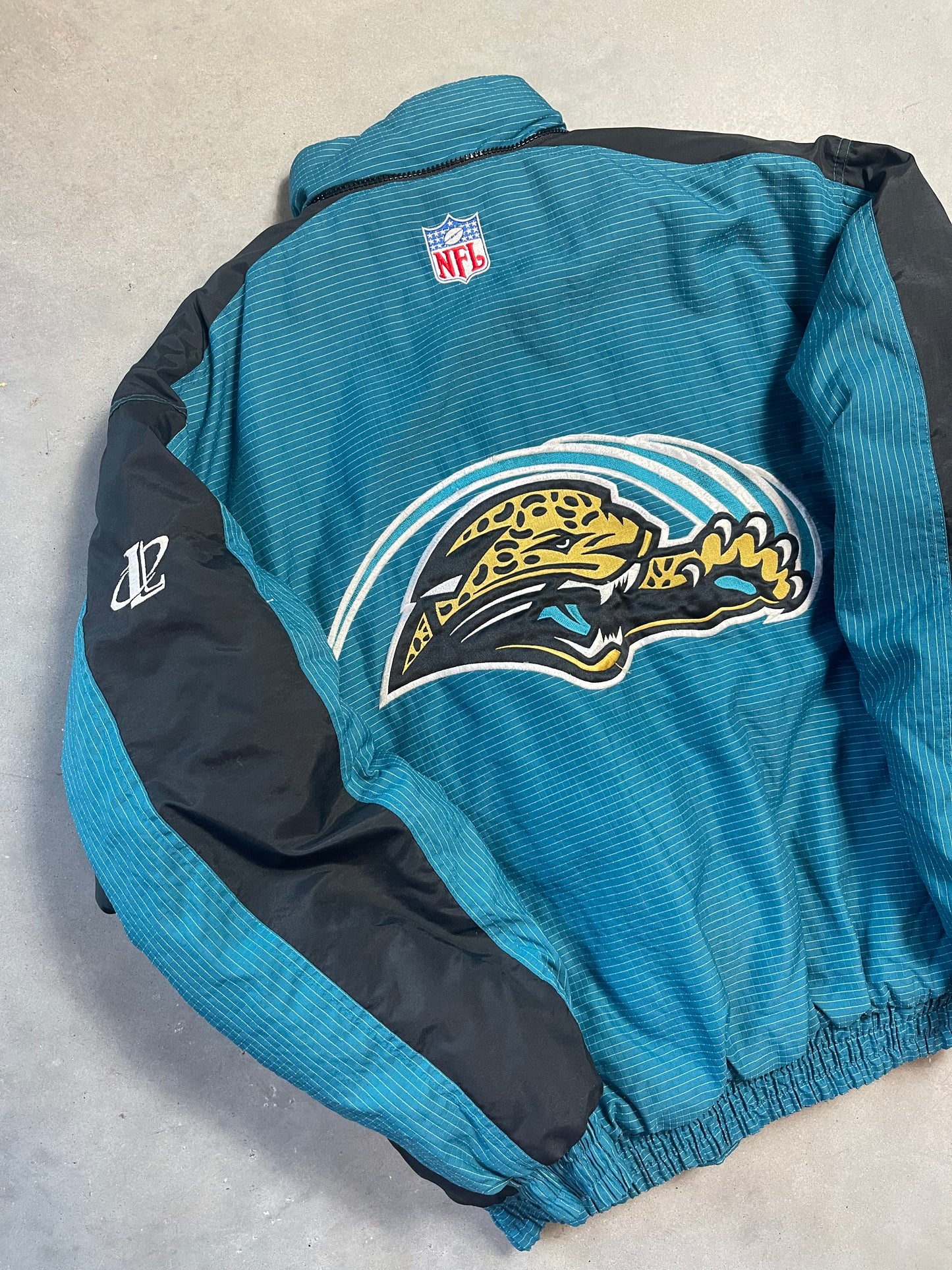 90’s Jacksonville Jaguars Vintage Logo Athletic NFL Puffer Jacket (