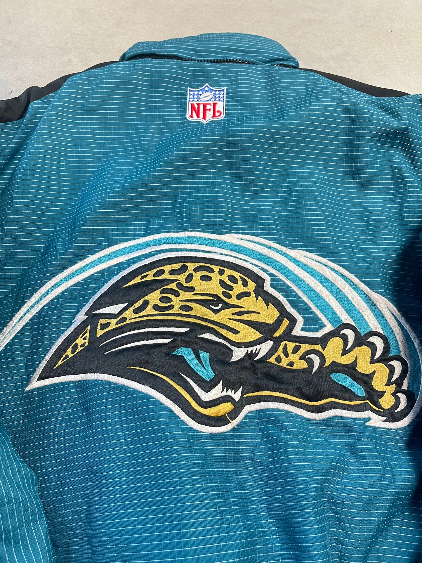 90’s Jacksonville Jaguars Vintage Logo Athletic NFL Puffer Jacket (