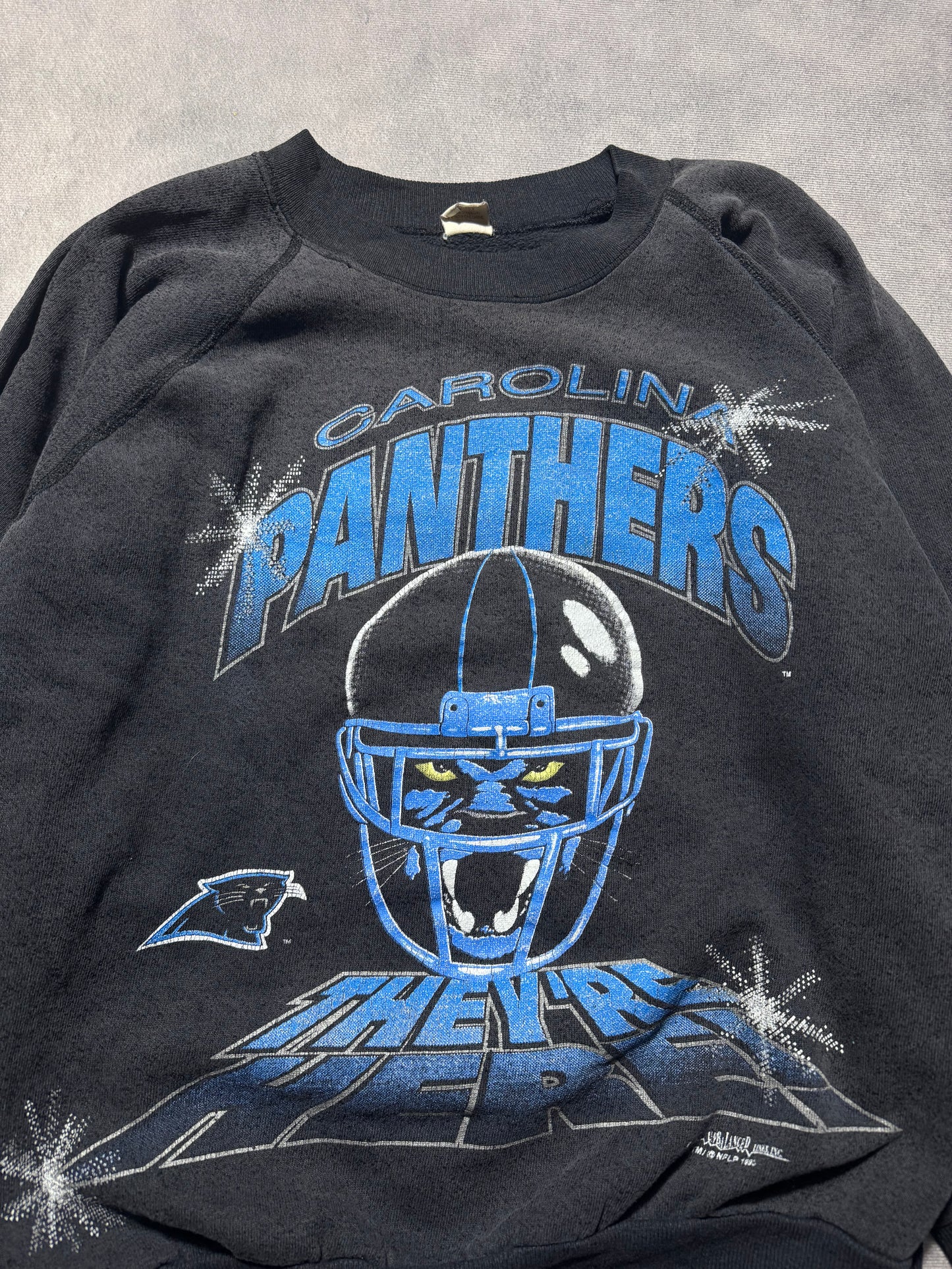 1993 Carolina Panthers Vintage Faded Black “They’re Here!” Franchise Announcement NFL Crewneck (Small)