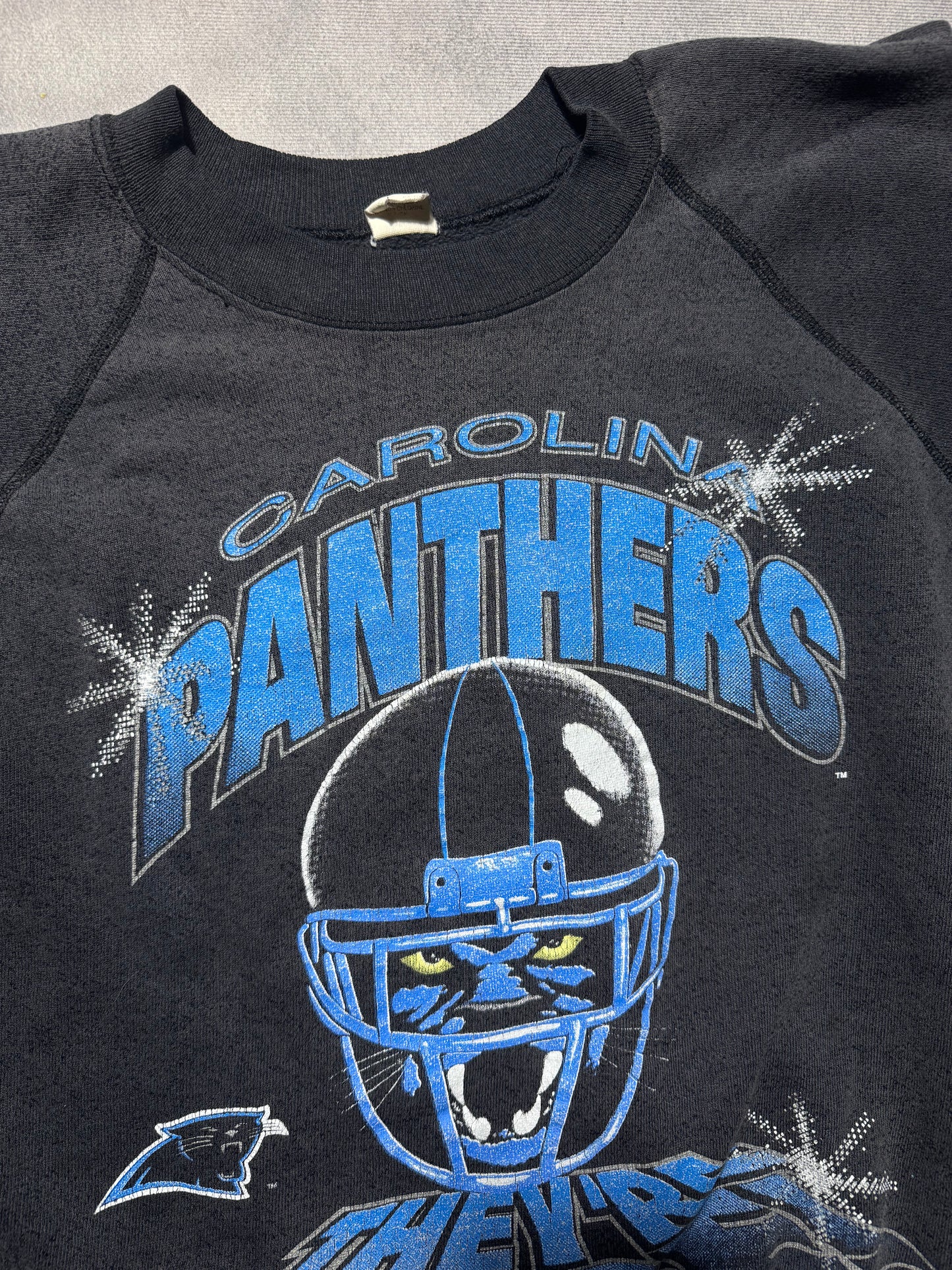 1993 Carolina Panthers Vintage Faded Black “They’re Here!” Franchise Announcement NFL Crewneck (Small)