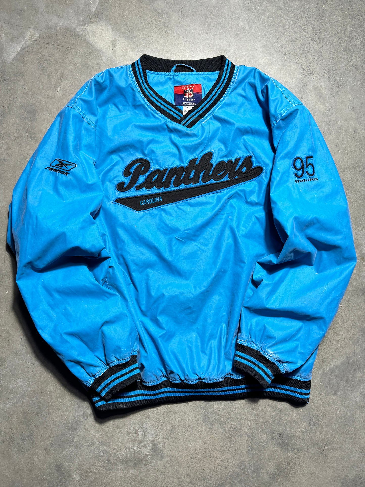 2003 Carolina Panthers Vintage Electric Blue Script Spellout Reebok Gridiron Collection Throwback Embroidered NFL Pullover Jacket (XL)